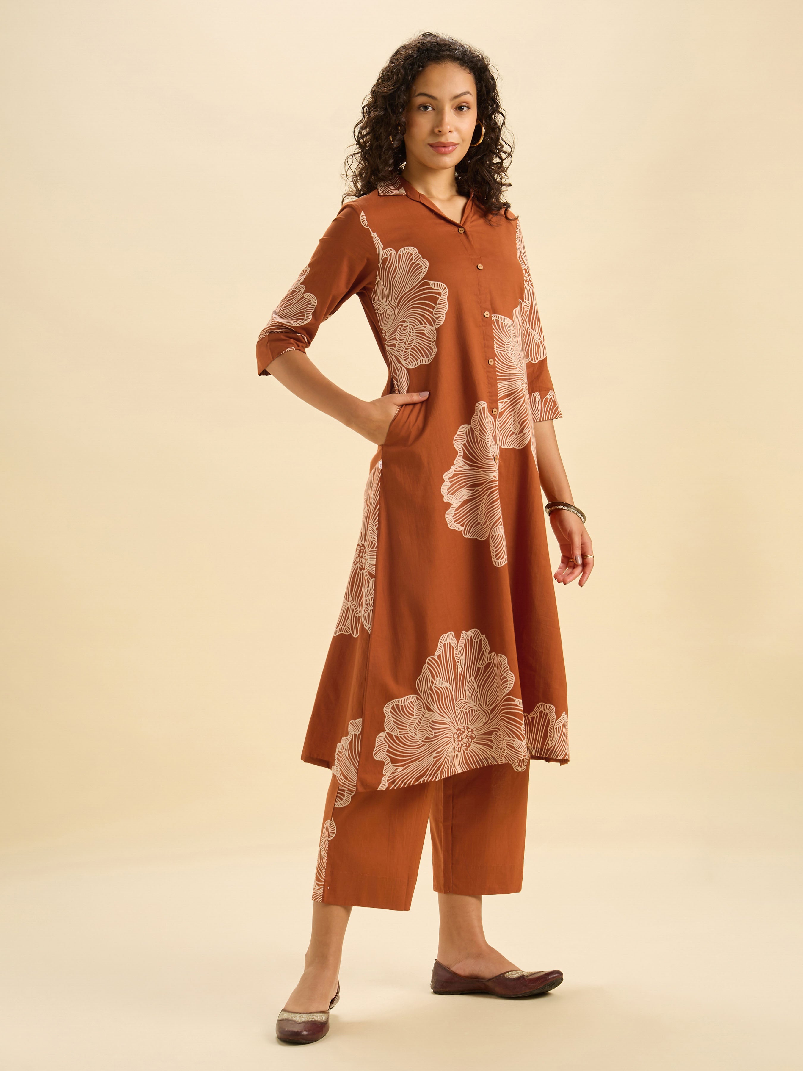 Rust Orange Pure Cotton Printed Flared Kurti Set