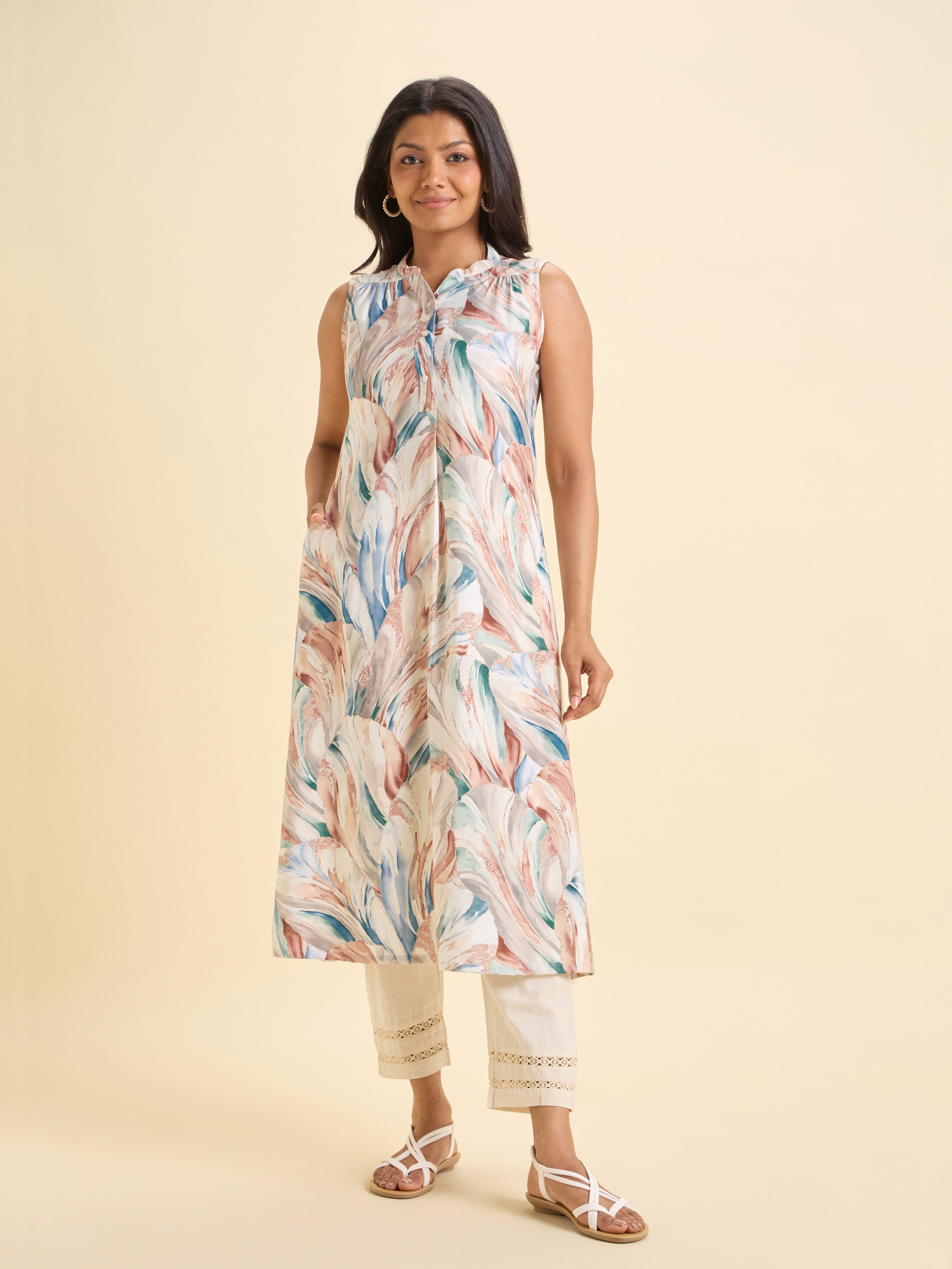 White Multi Colour Poly Viscose Print Flared Sleeve Less Kurti With Knife Pleat