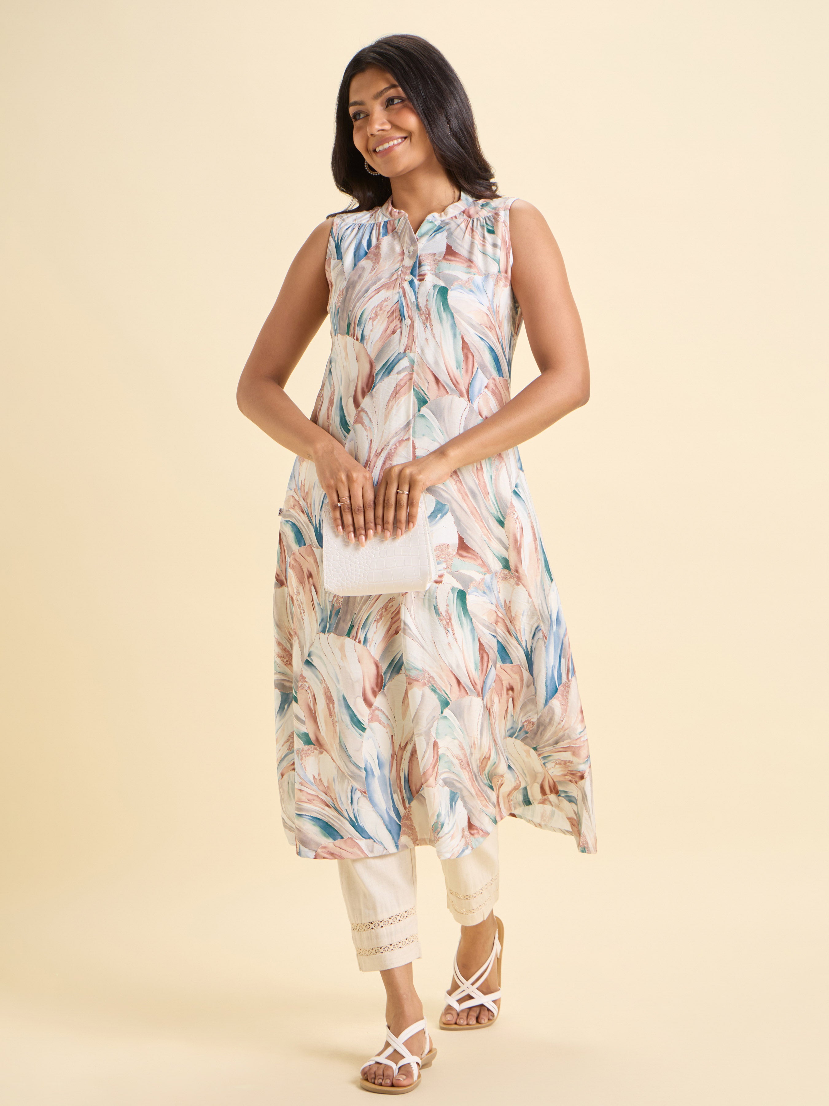 White Multi Colour Poly Viscose Print Flared Sleeve Less Kurti With Knife Pleat