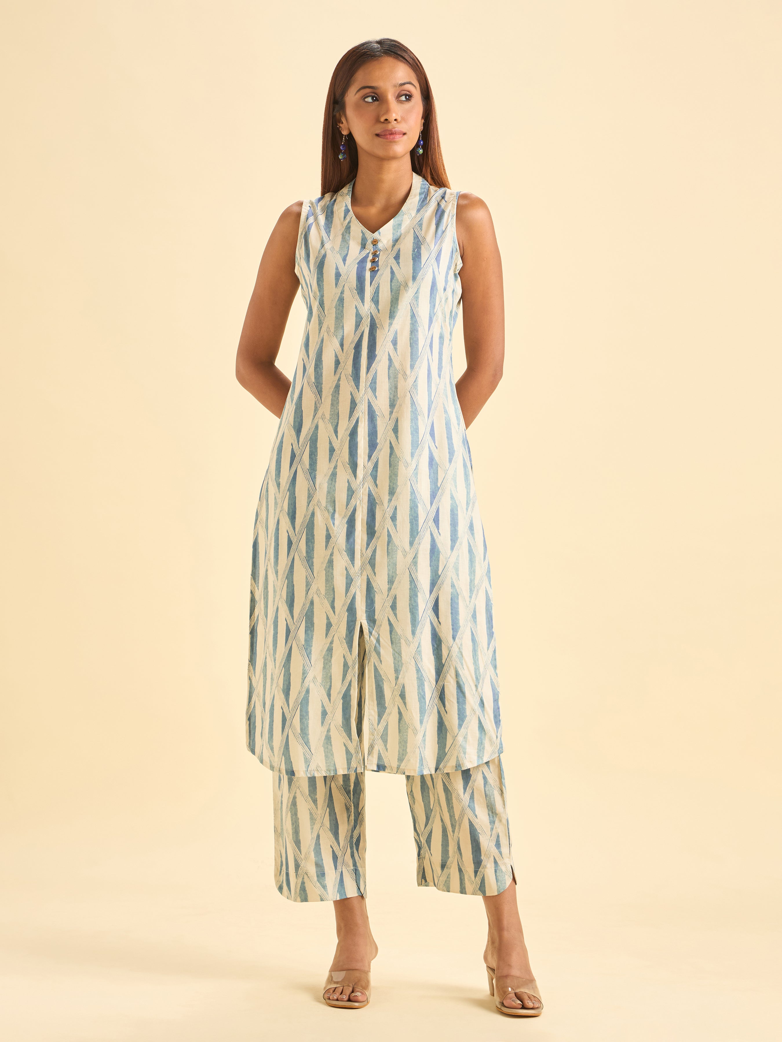 Ivory And Blue Pure Cotton Printed Sleeveless Slited Kurti Set With Liberty Cut