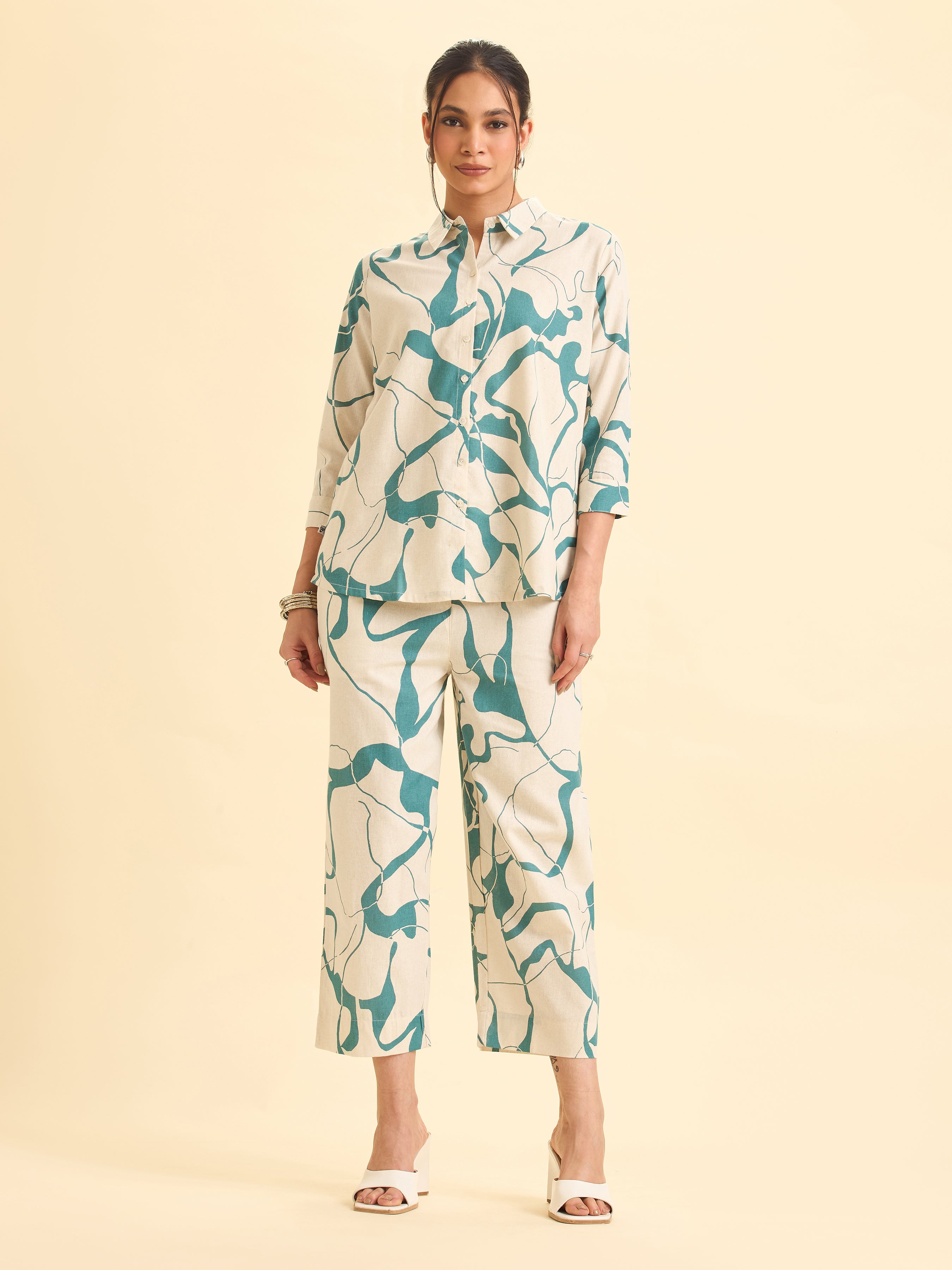 Ivory And Teal Cotton Flax Printed Flared Kurti With Curved Hem