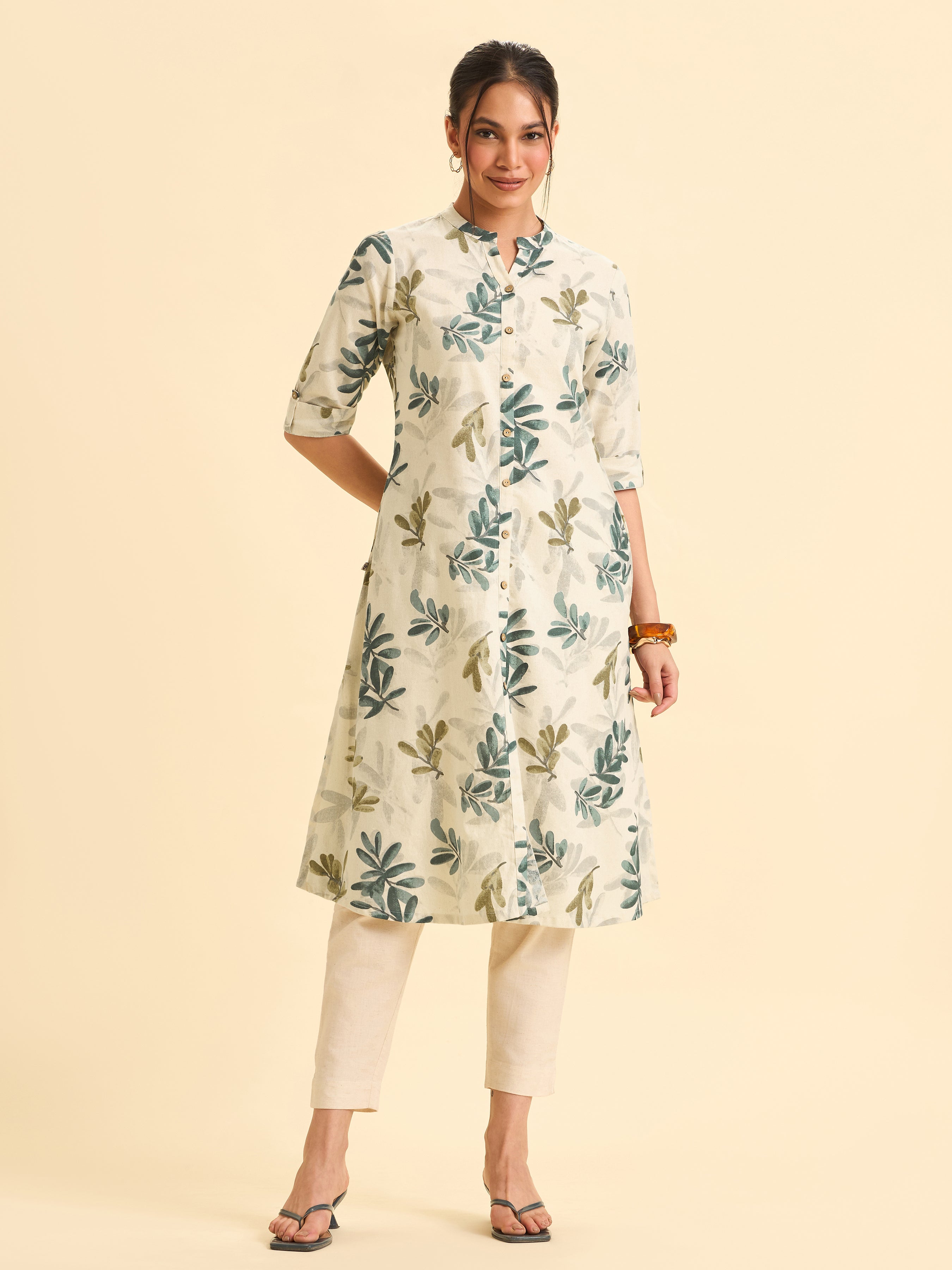 Ivory Cotton Flax Flared Kurti With Multi Colour Print And Curved Hem
