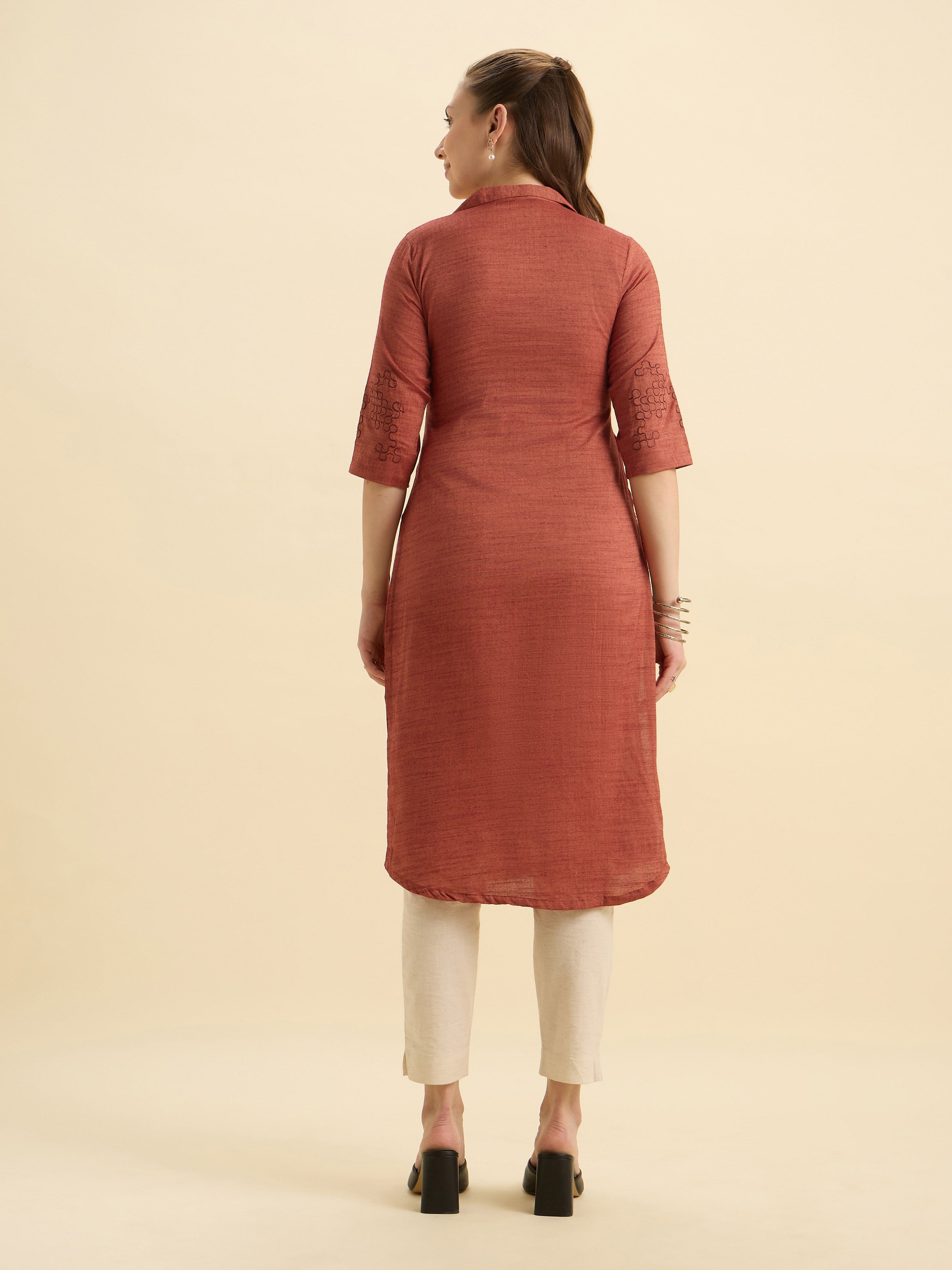 Rust Orange Cotton Viscose Slitted Kurti With Embroidery And Curved Hemline