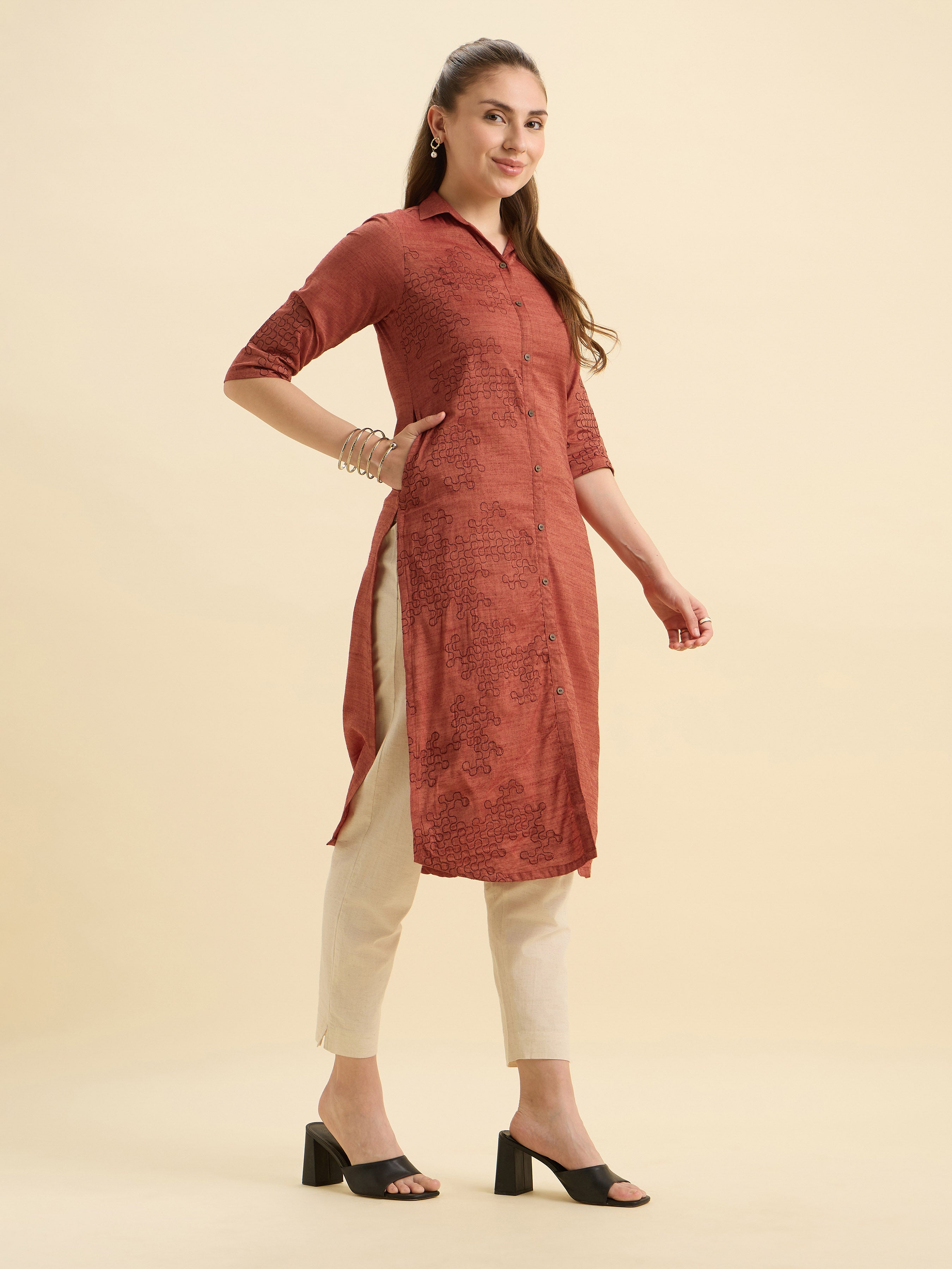 Rust Orange Cotton Viscose Slitted Kurti With Embroidery And Curved Hemline