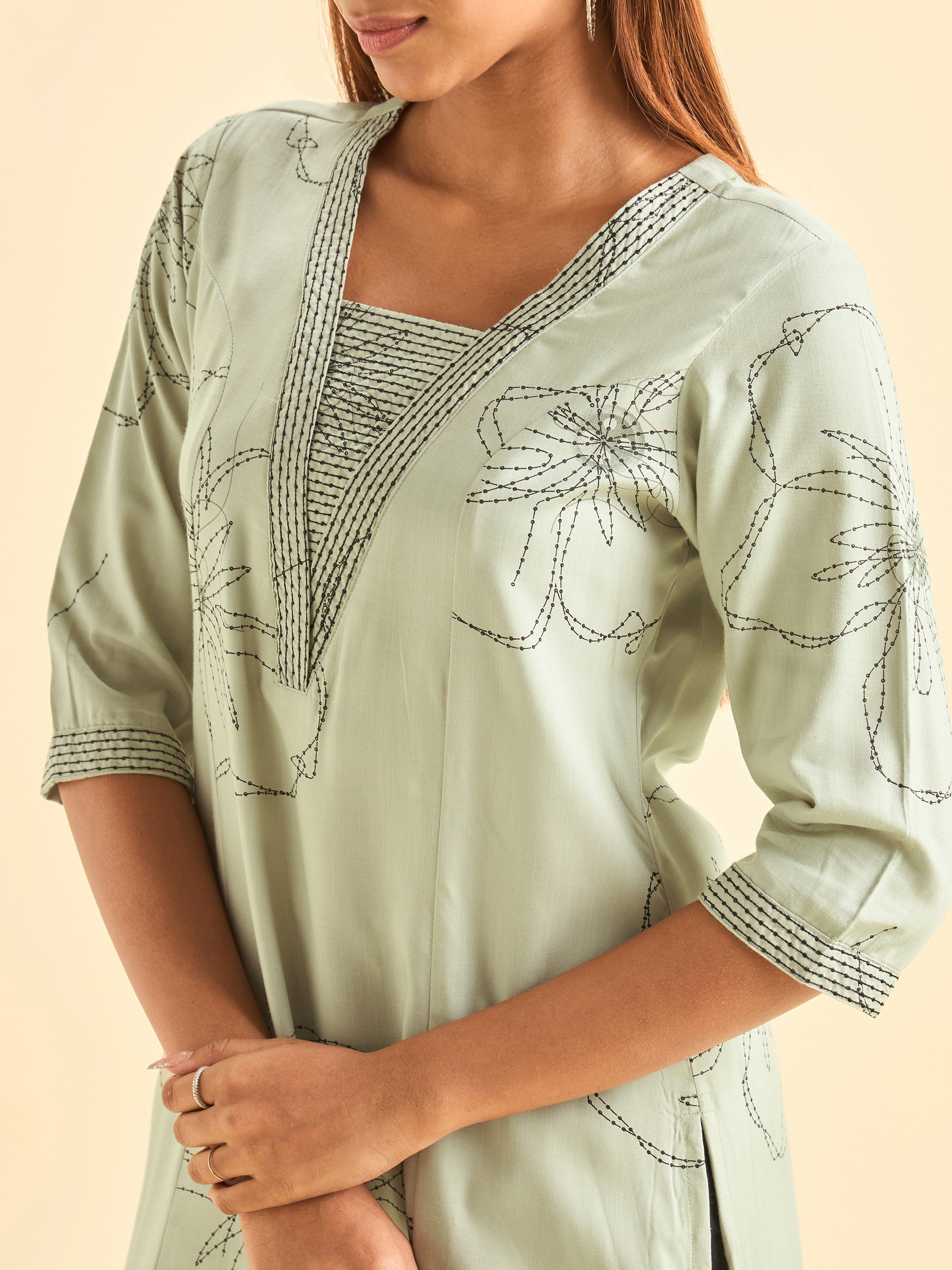 Pastel Green and Black Viscose Printed Flared Kurti With Embroidery