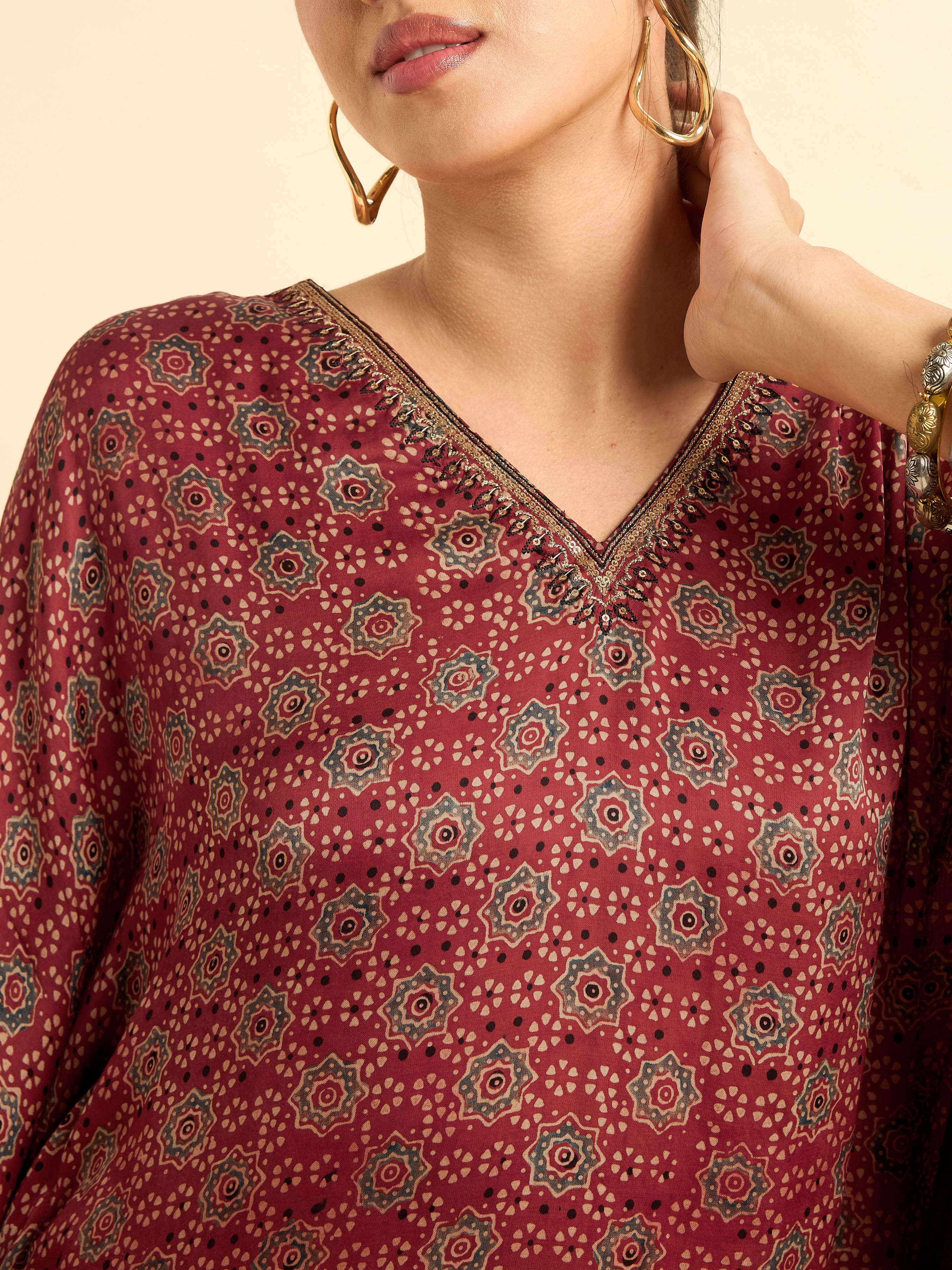 Women Wearing Maroon Multi Colour Modal Satin Kaftan  With Embroidery Sequins Work