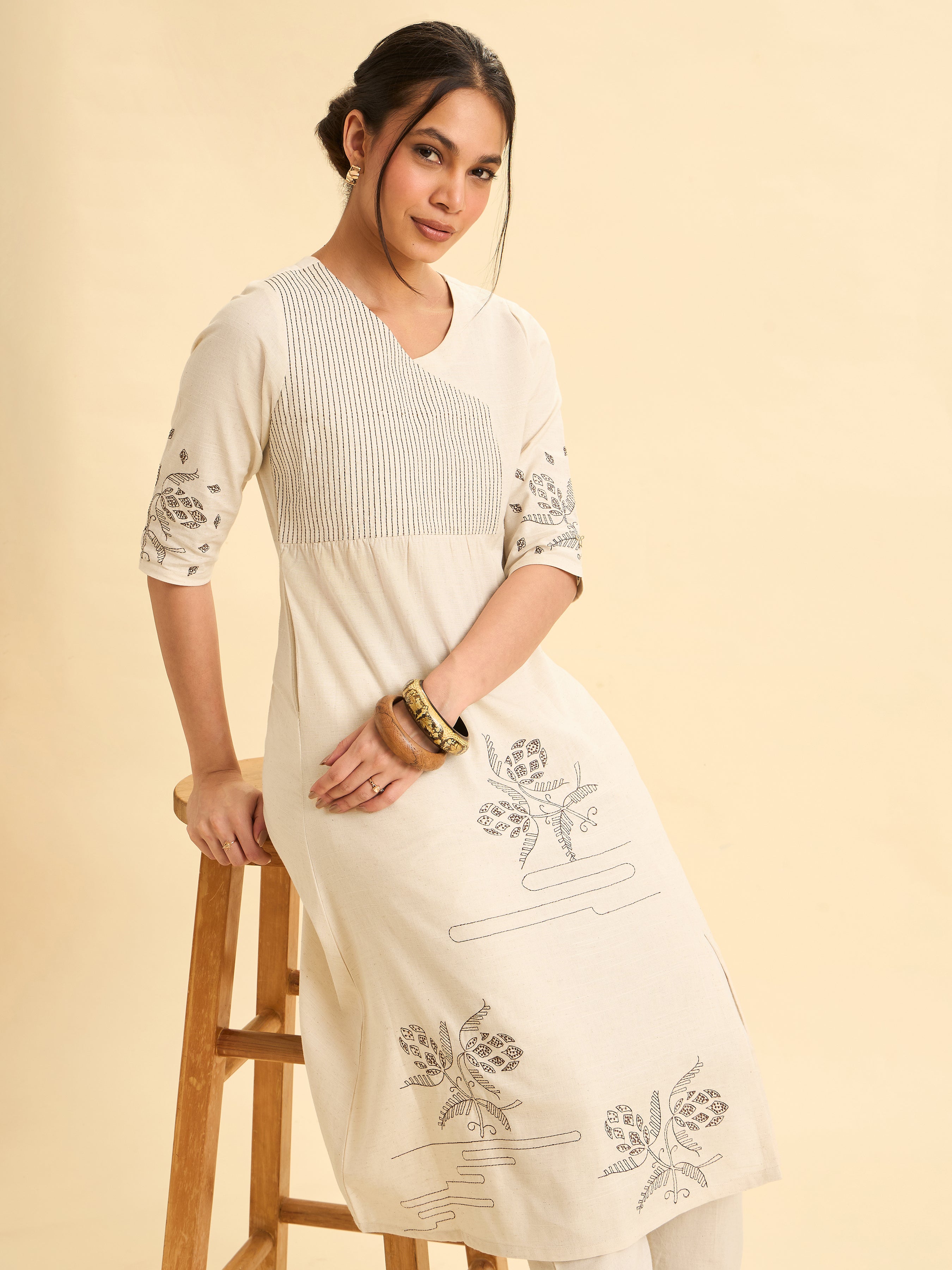 Ivory Cotton Flax Slub Embroideriy Kurti With Panelcut And Gathers