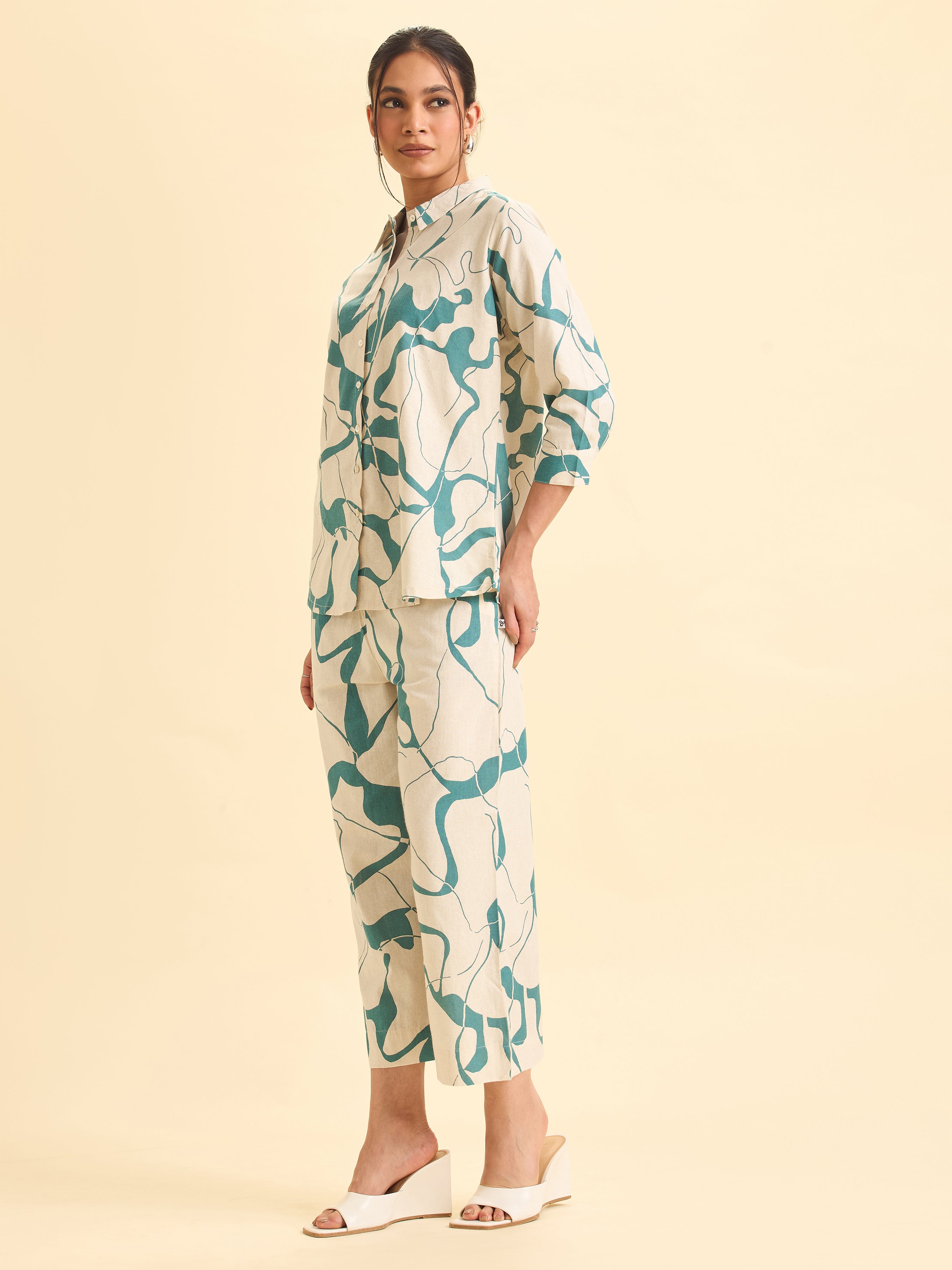 Ivory And Teal Cotton Flax Printed Flared Kurti With Curved Hem