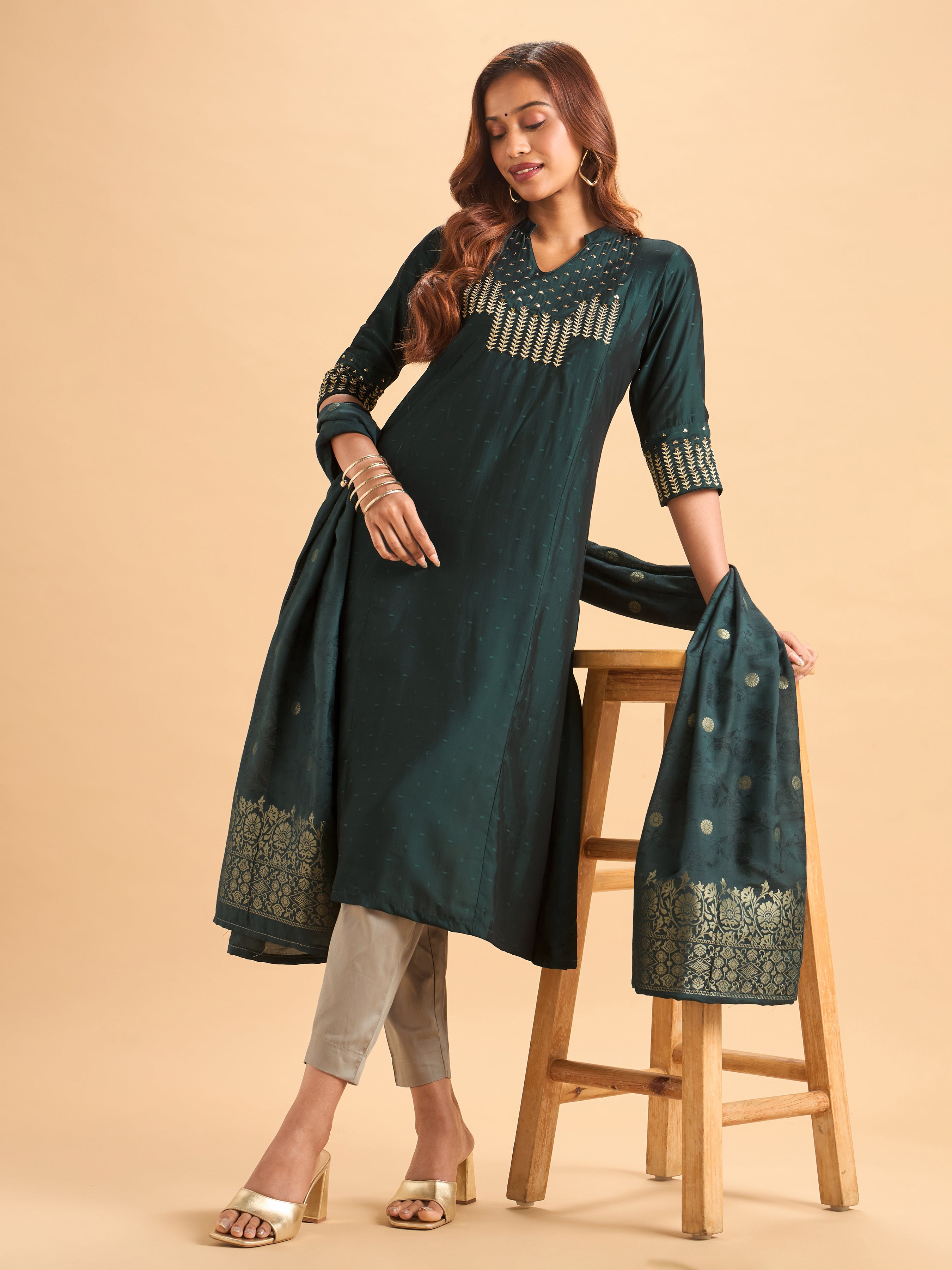 Women Wearing Bottle Green Viscose Blend Kurti Set With Dupatta And Handwork Embroidery
