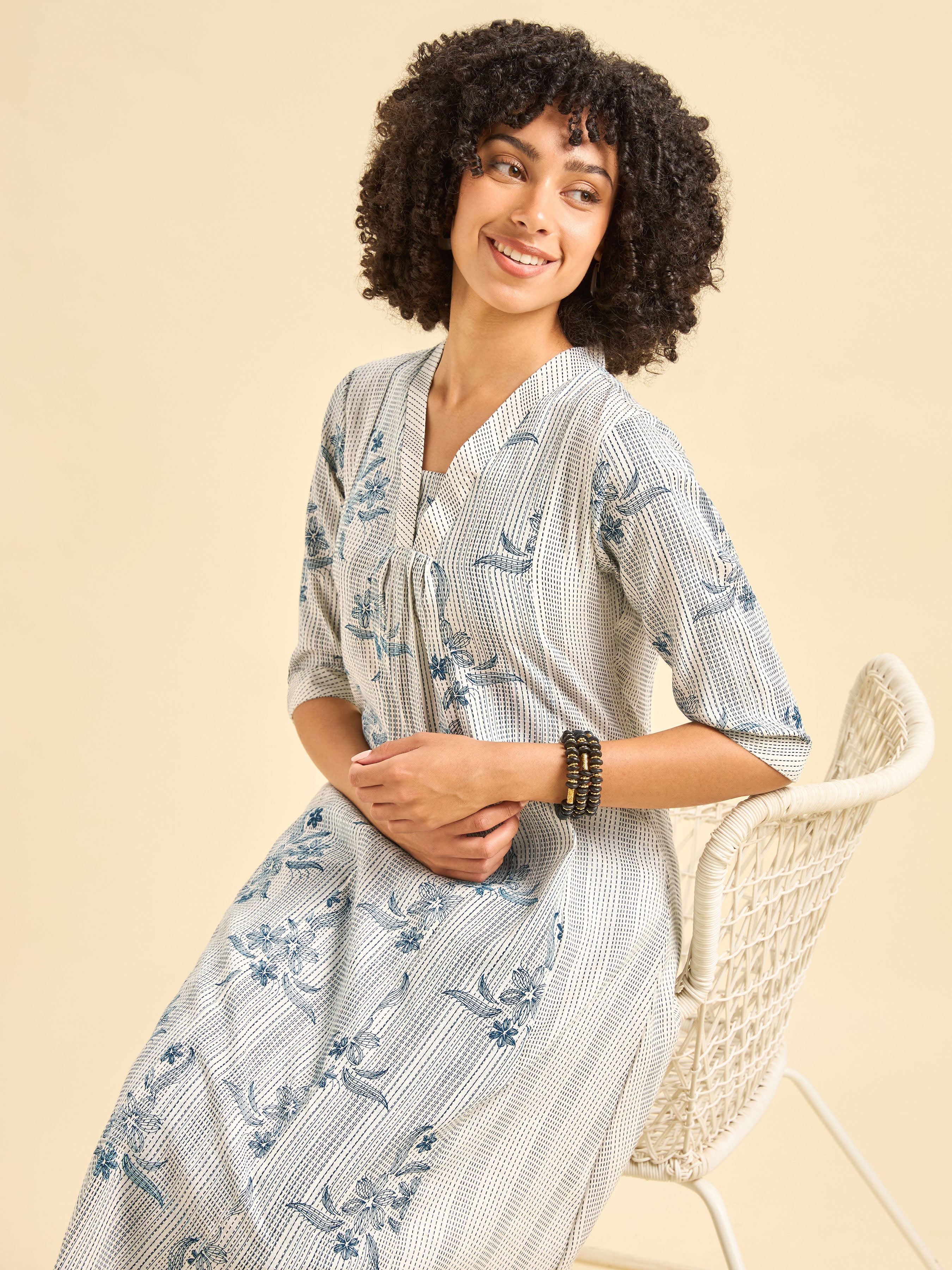 White And Navy Blue Cotton Blend Foil Print Flared Kurti With Panel Cut
