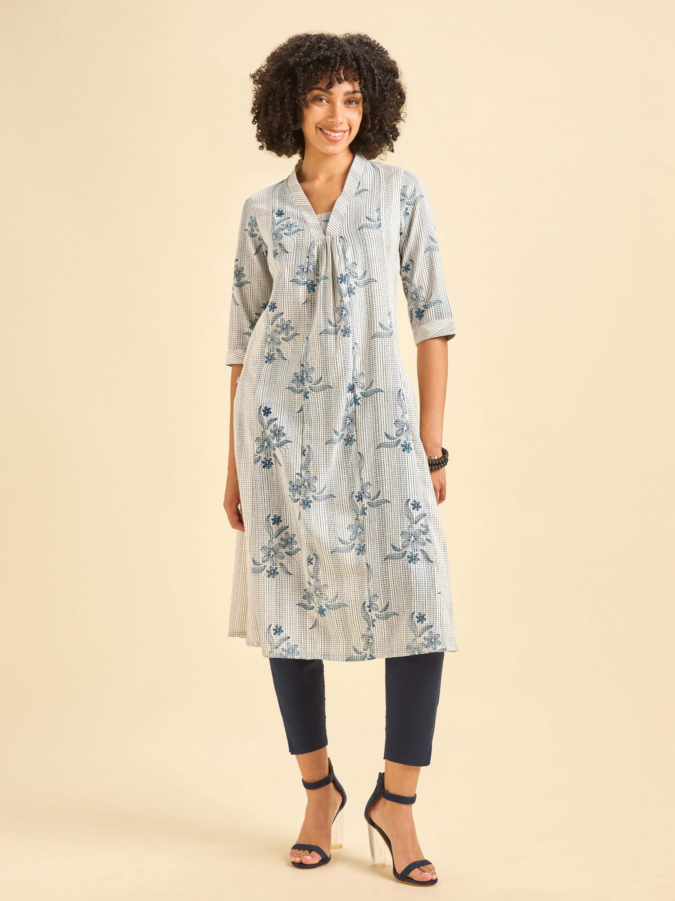 White And Navy Blue Cotton Blend Foil Print Flared Kurti With Panel Cut