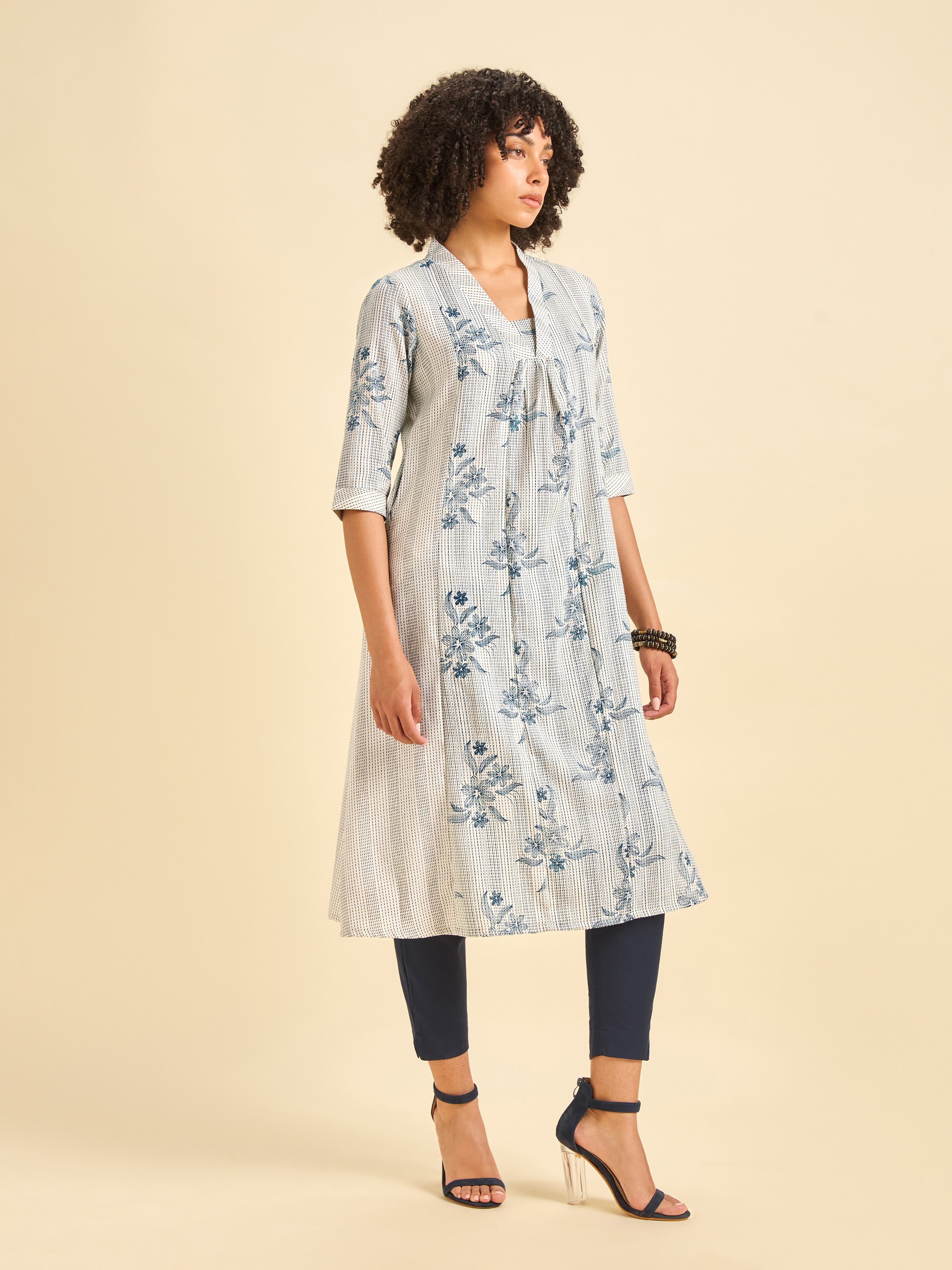 White And Navy Blue Cotton Blend Foil Print Flared Kurti With Panel Cut