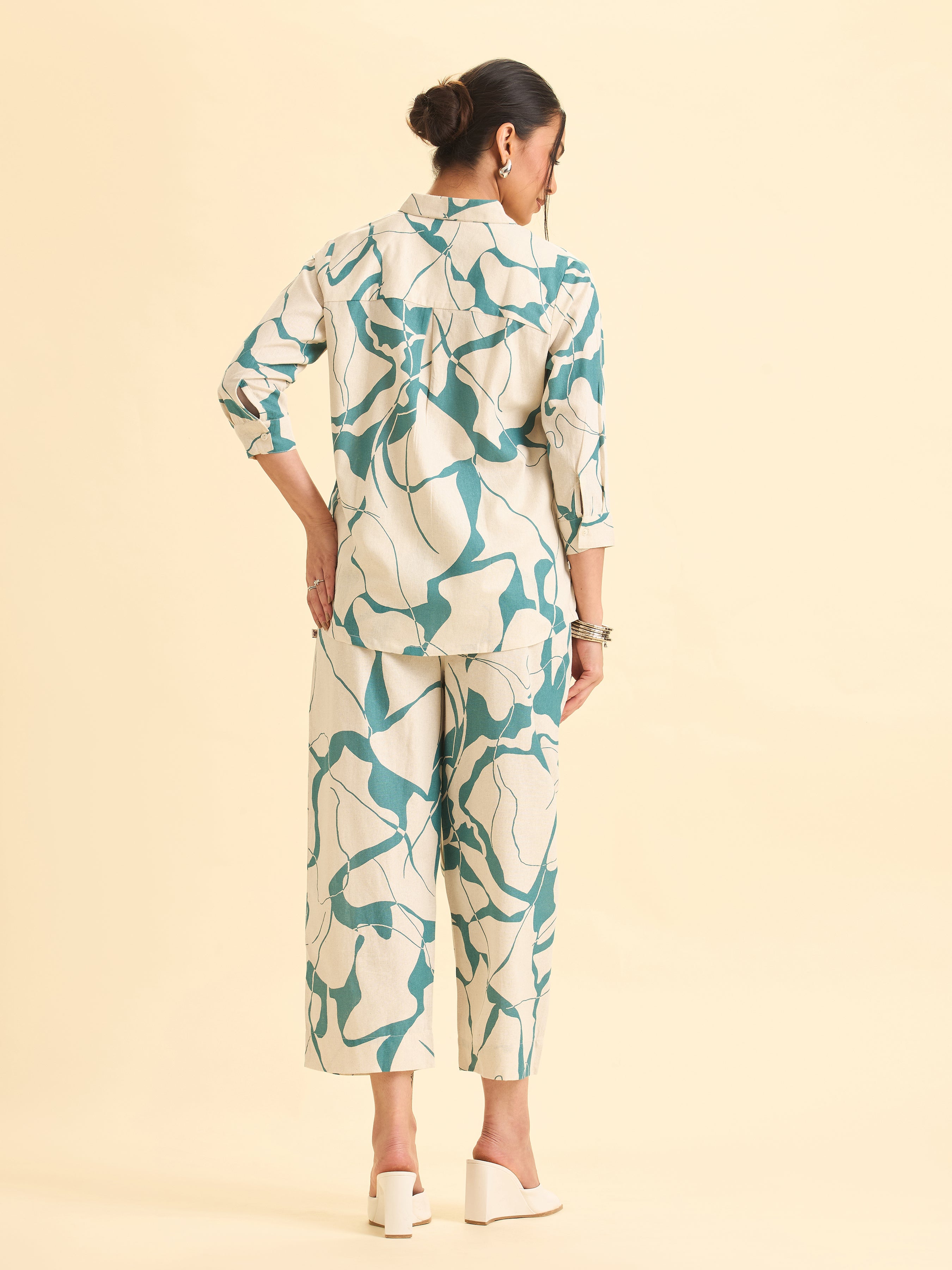 Ivory And Teal Cotton Flax Printed Flared Kurti With Curved Hem