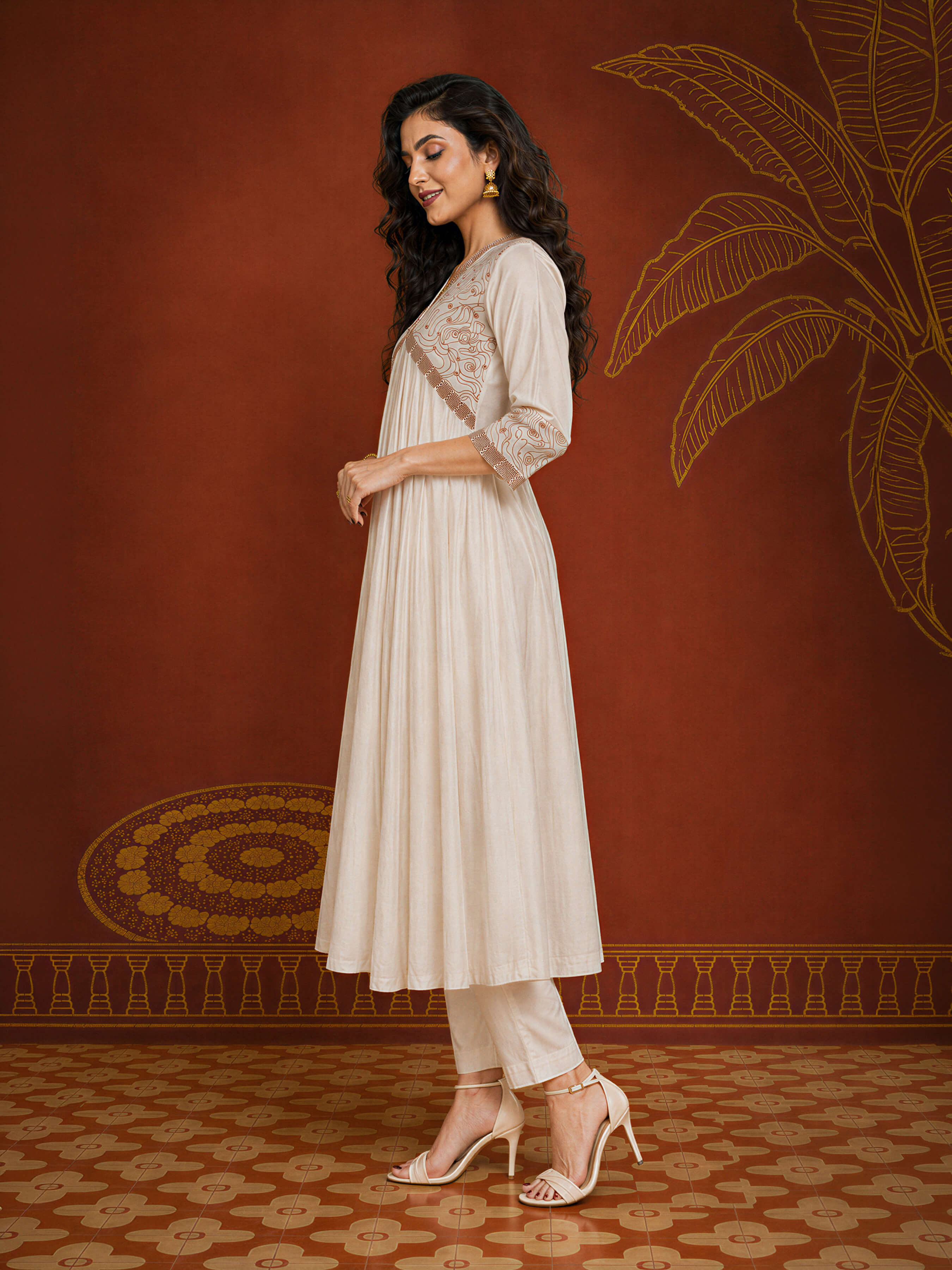 Ivory Mull Chanderi Plain Flared Kali Cut Kurti With Sequence Work Embroidery