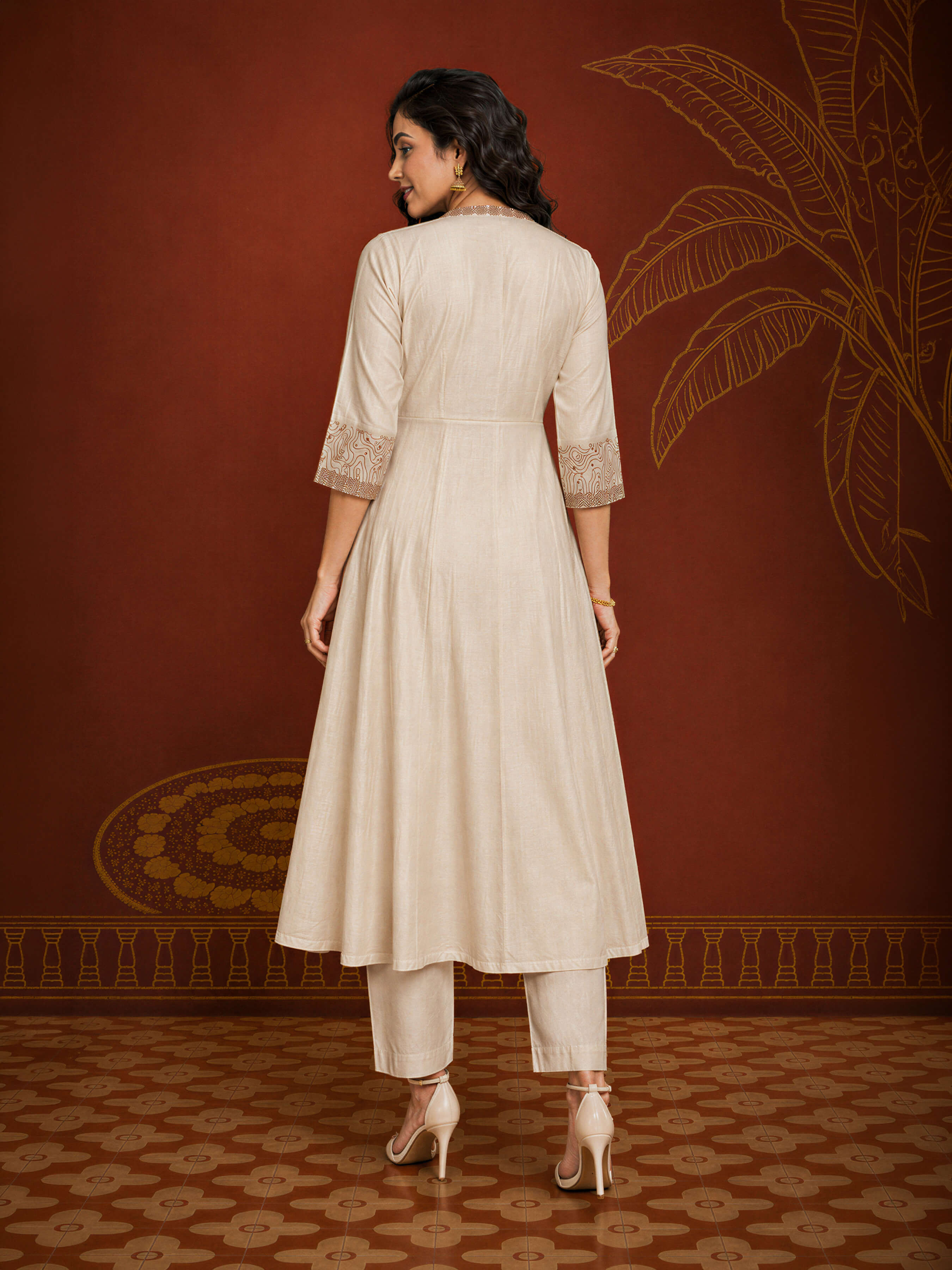 Ivory Mull Chanderi Plain Flared Kali Cut Kurti With Sequence Work Embroidery