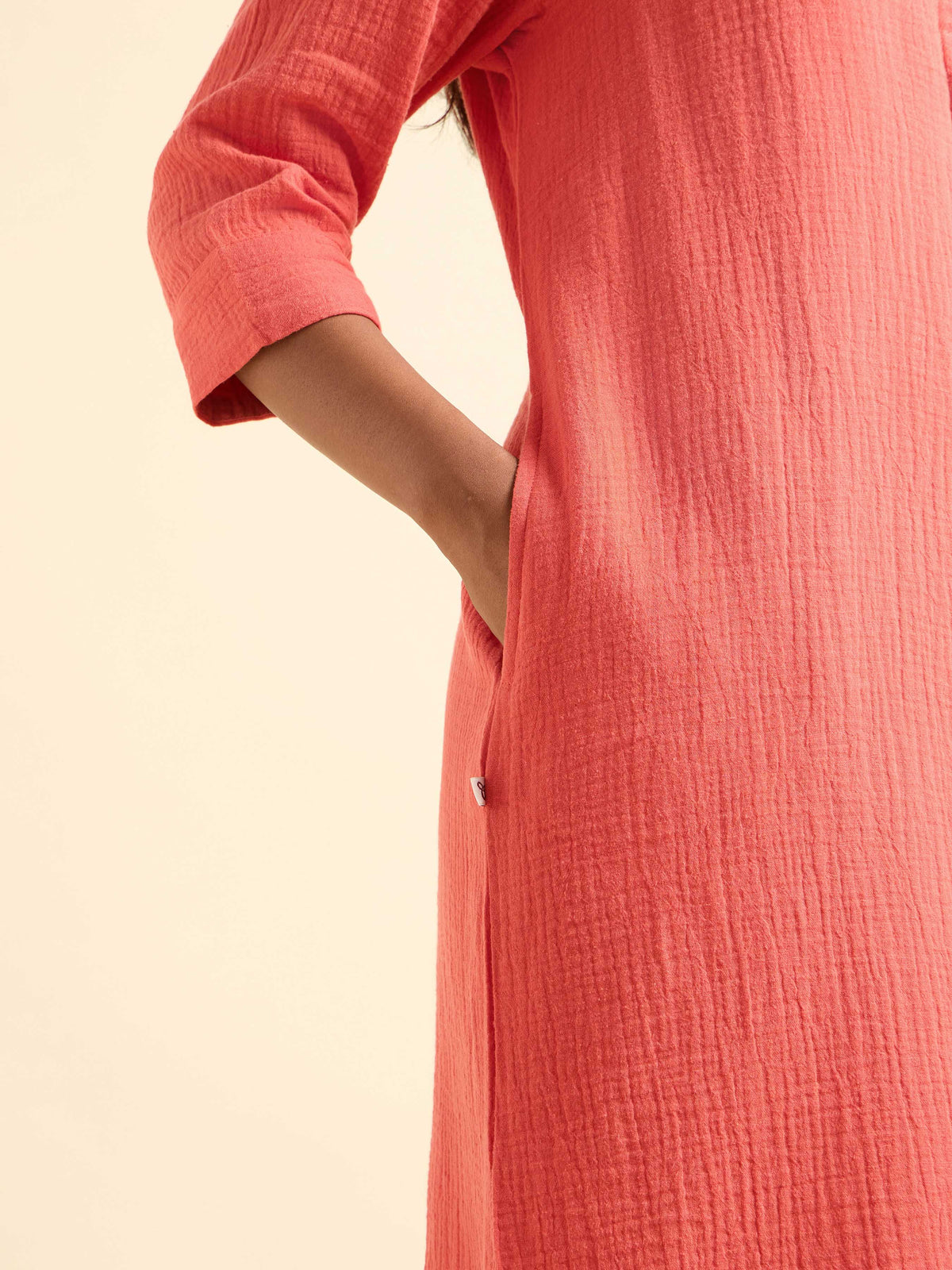 Coral Colour Cotton Double Cloth Plain Kurti With Flared Centre Cut Relaxed Fit Curved Hem