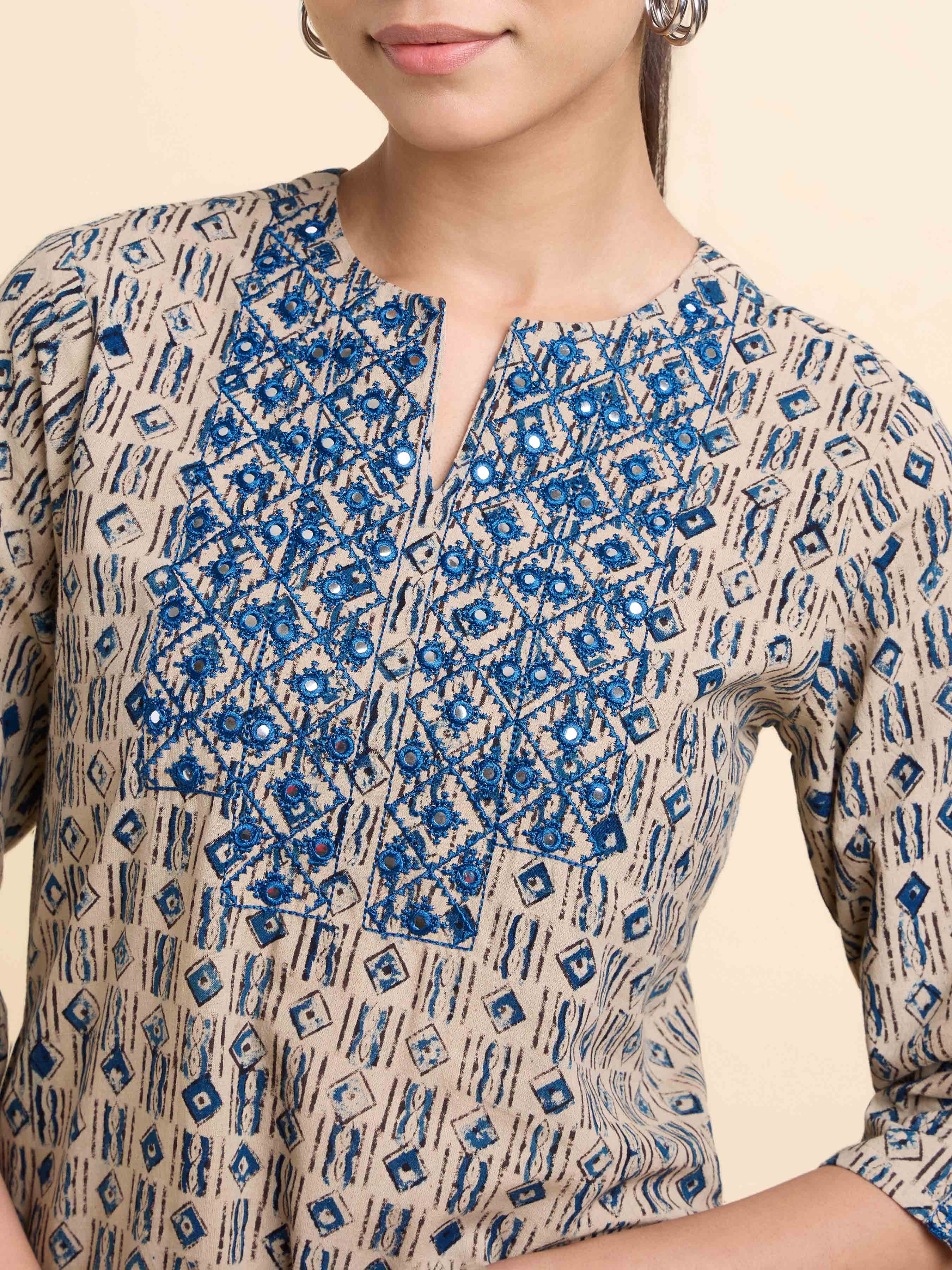 Ivory & Blue Colored Cotton Printed Slitted Kurti With Embroidery Mirror Work