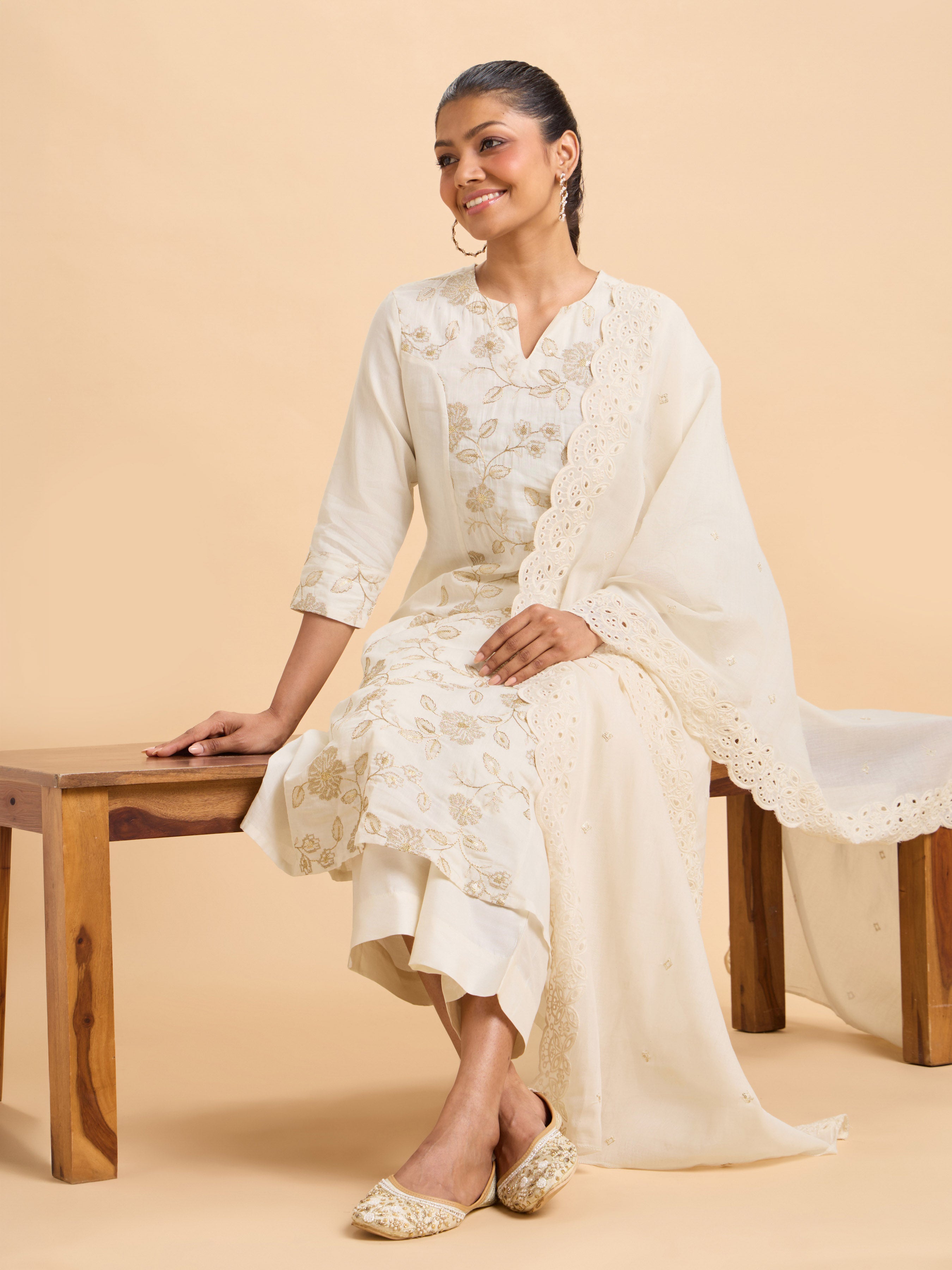 Ivory Gold Pure Cotton Plain Flared Princess Cut Kurti Set With Sequins Embroidery And Dupatta