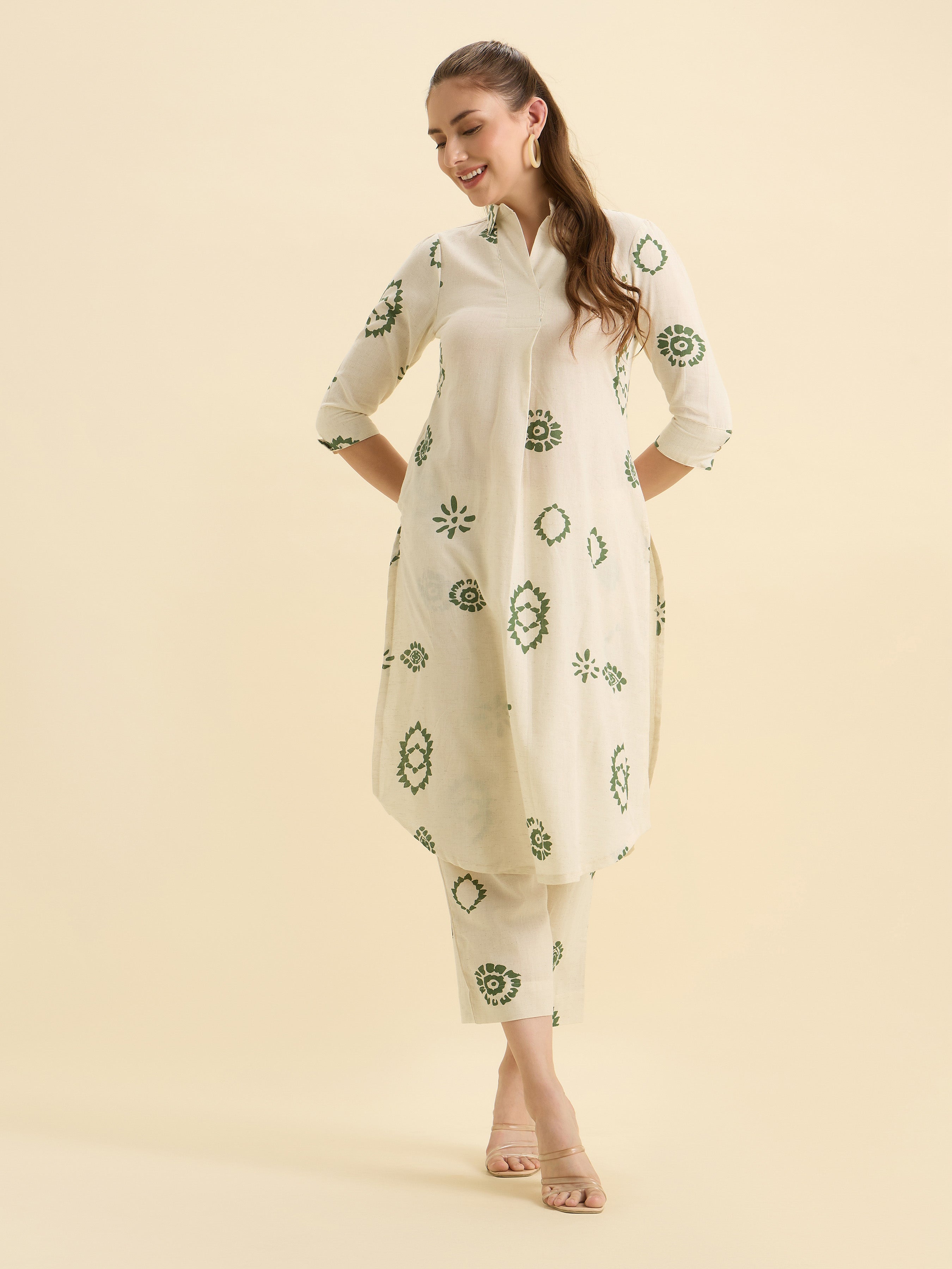Ivory Green Cotton Flax Printed Slited Kurti Set With Knife Pleats & Curved Hem Line