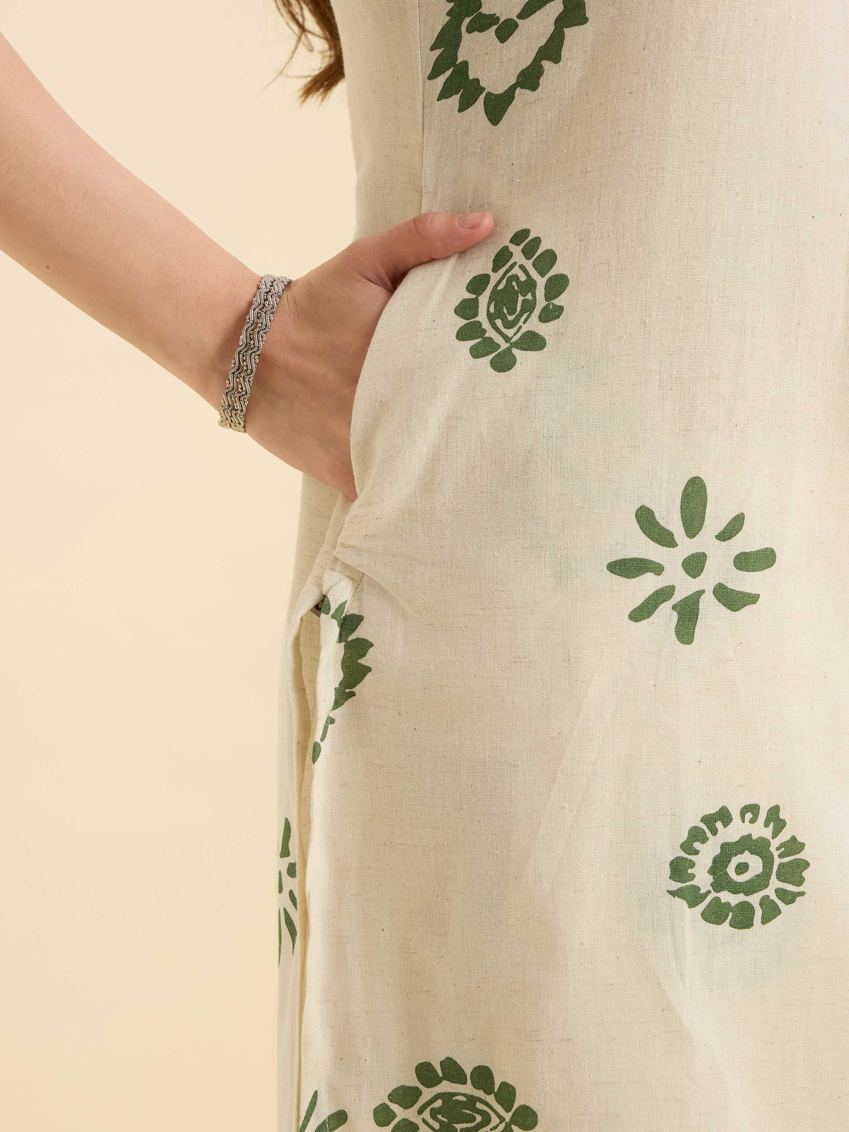 Ivory Green Cotton Flax Printed Slited Kurti Set With Knife Pleats & Curved Hem Line