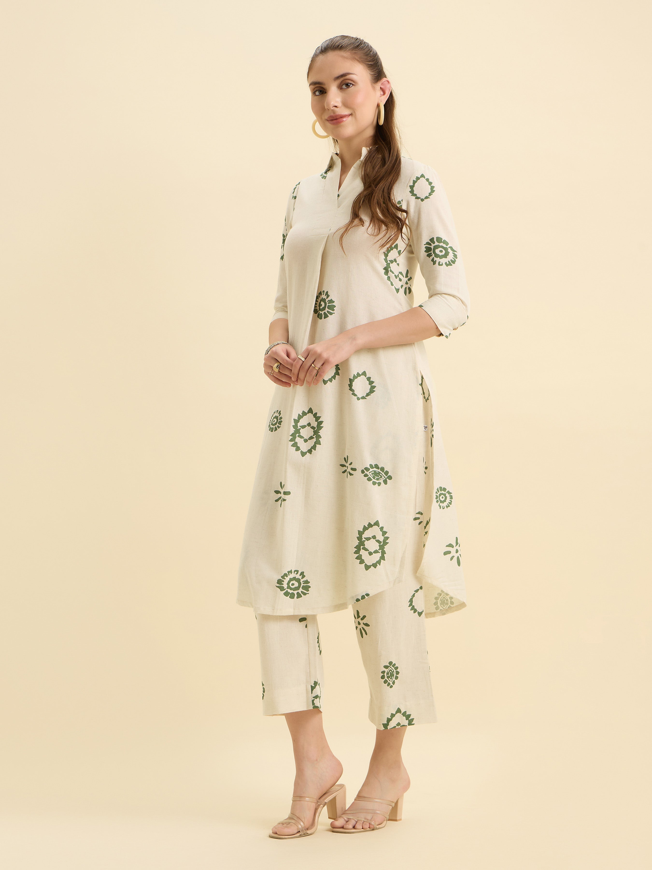 Ivory Green Cotton Flax Printed Slited Kurti Set With Knife Pleats & Curved Hem Line