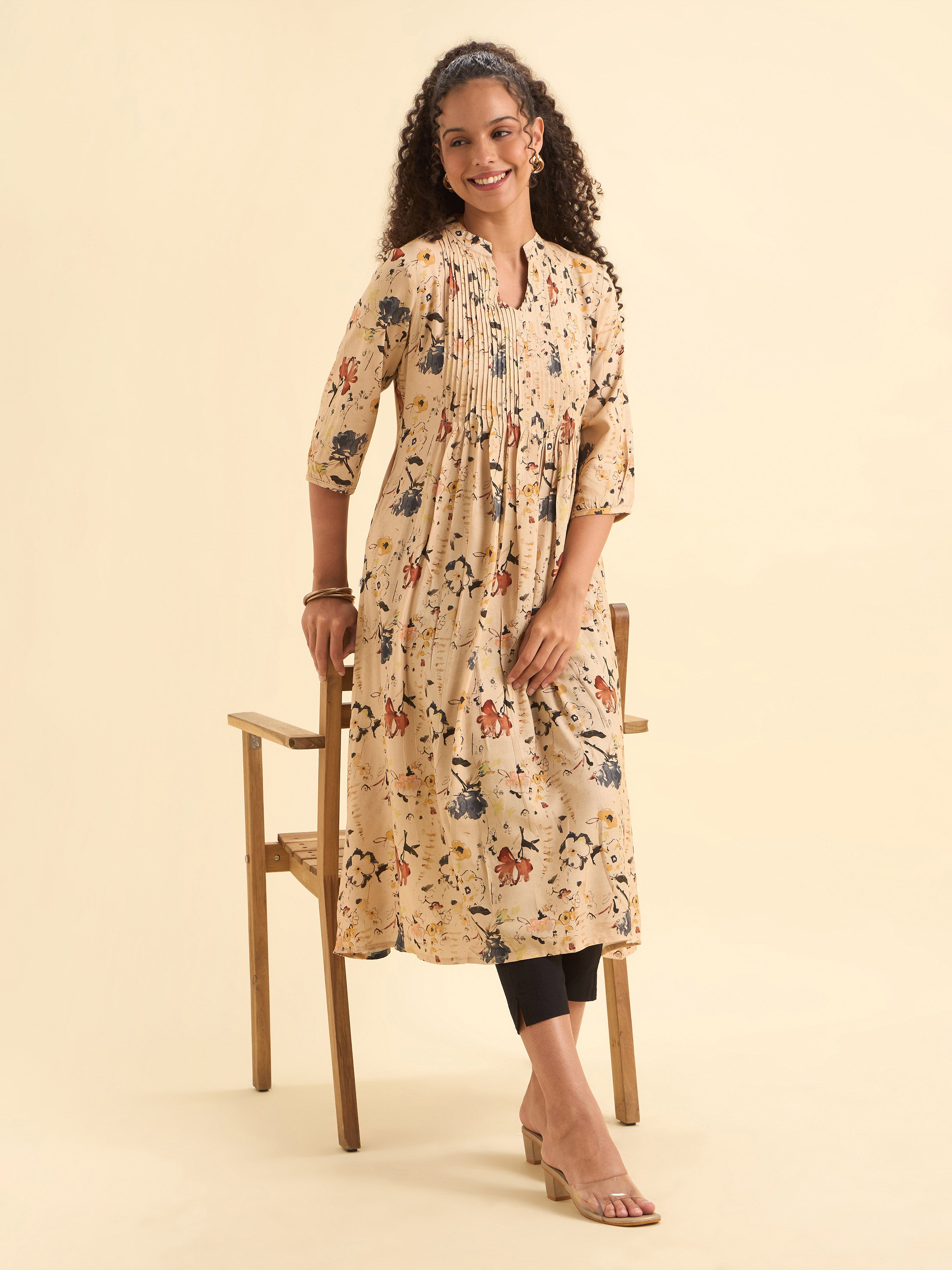 Ivory Viscose Flared Printed Kurti With Pintucks