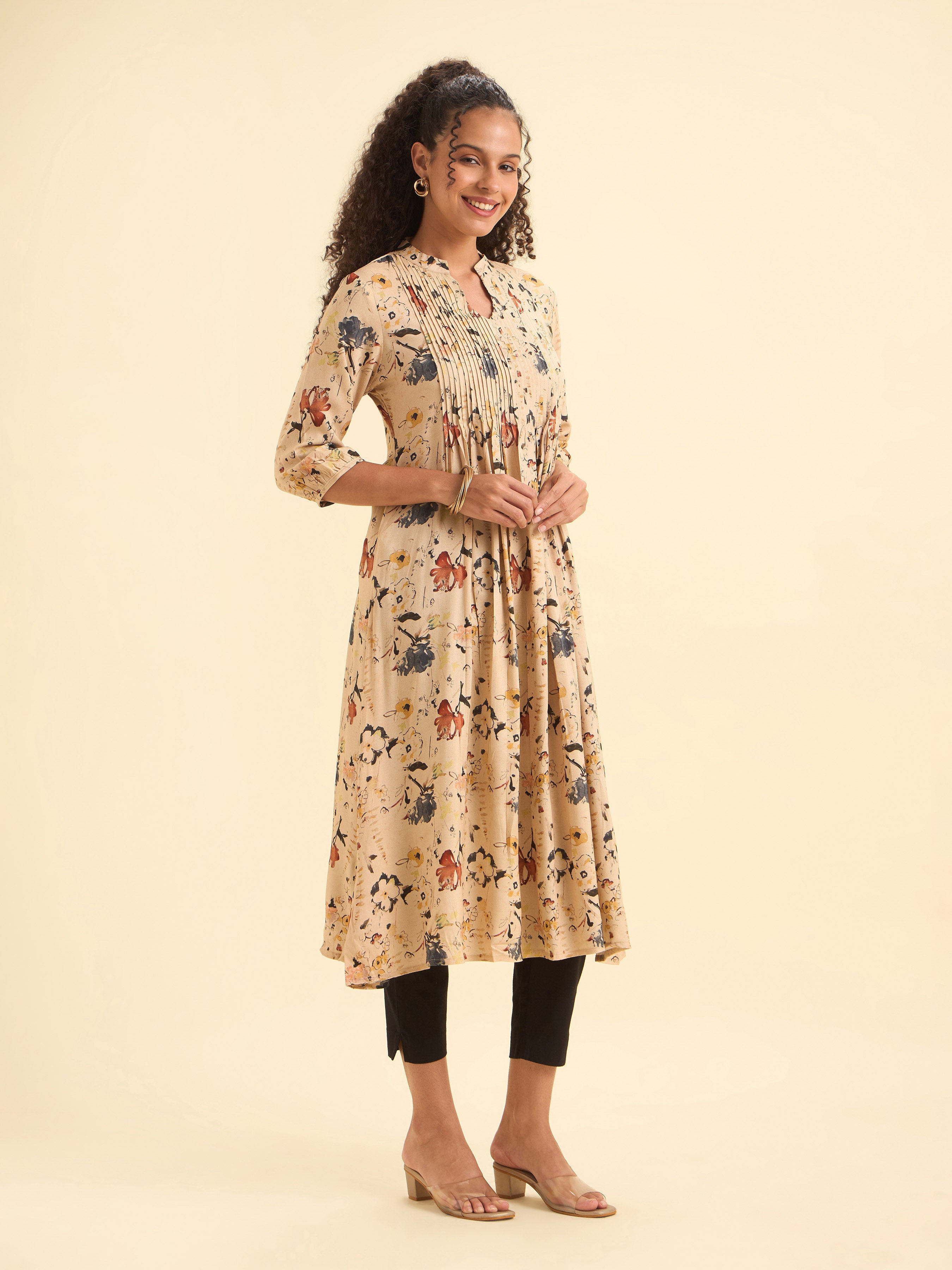 Ivory Viscose Flared Printed Kurti With Pintucks