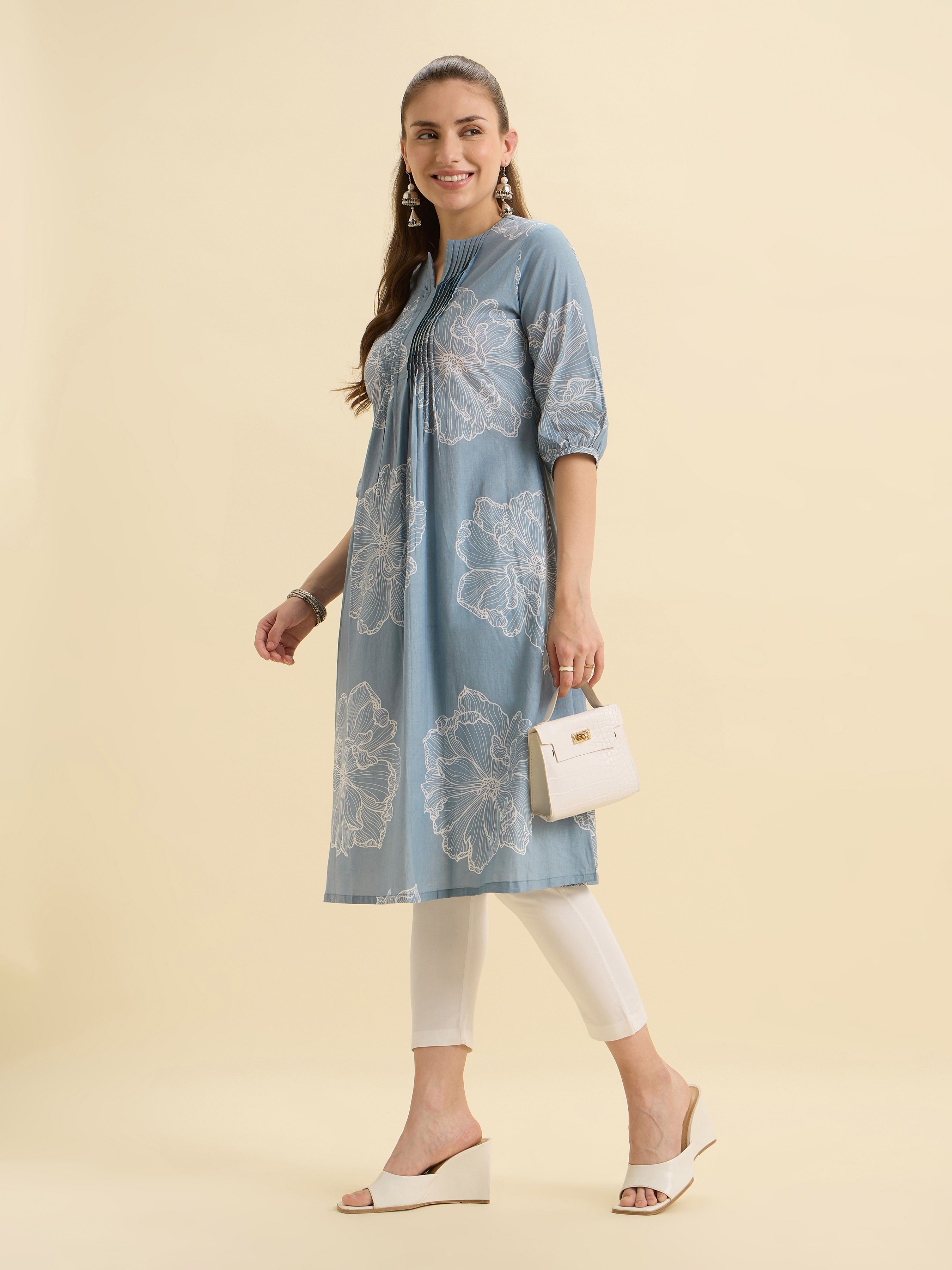 Light Blue White Colour Pure Cotton Flared Printed Kurti With Pleats