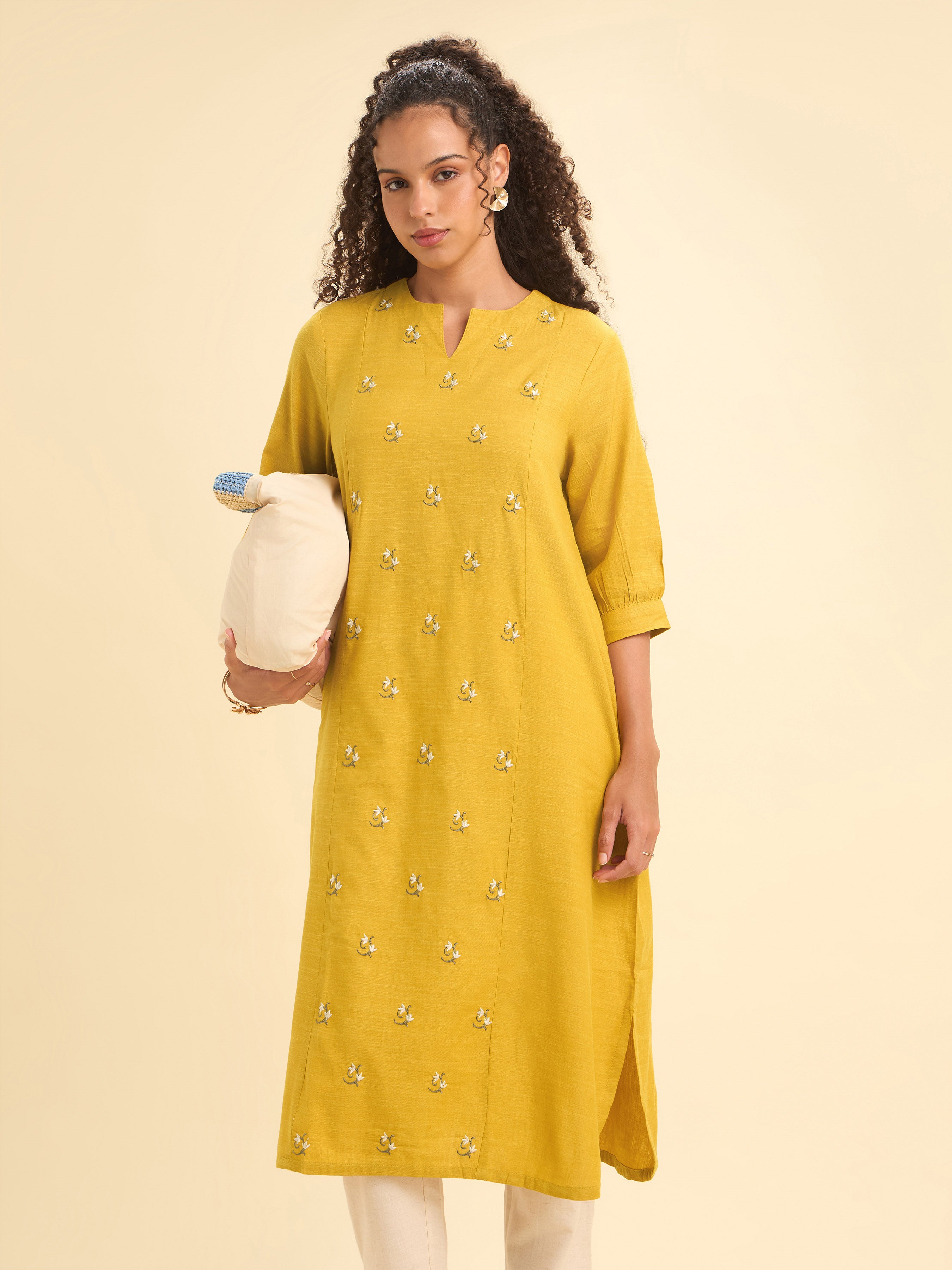 Mustard Cotton Viscose Slub Plain Flared Kurti With Curved Hem And Embroidery