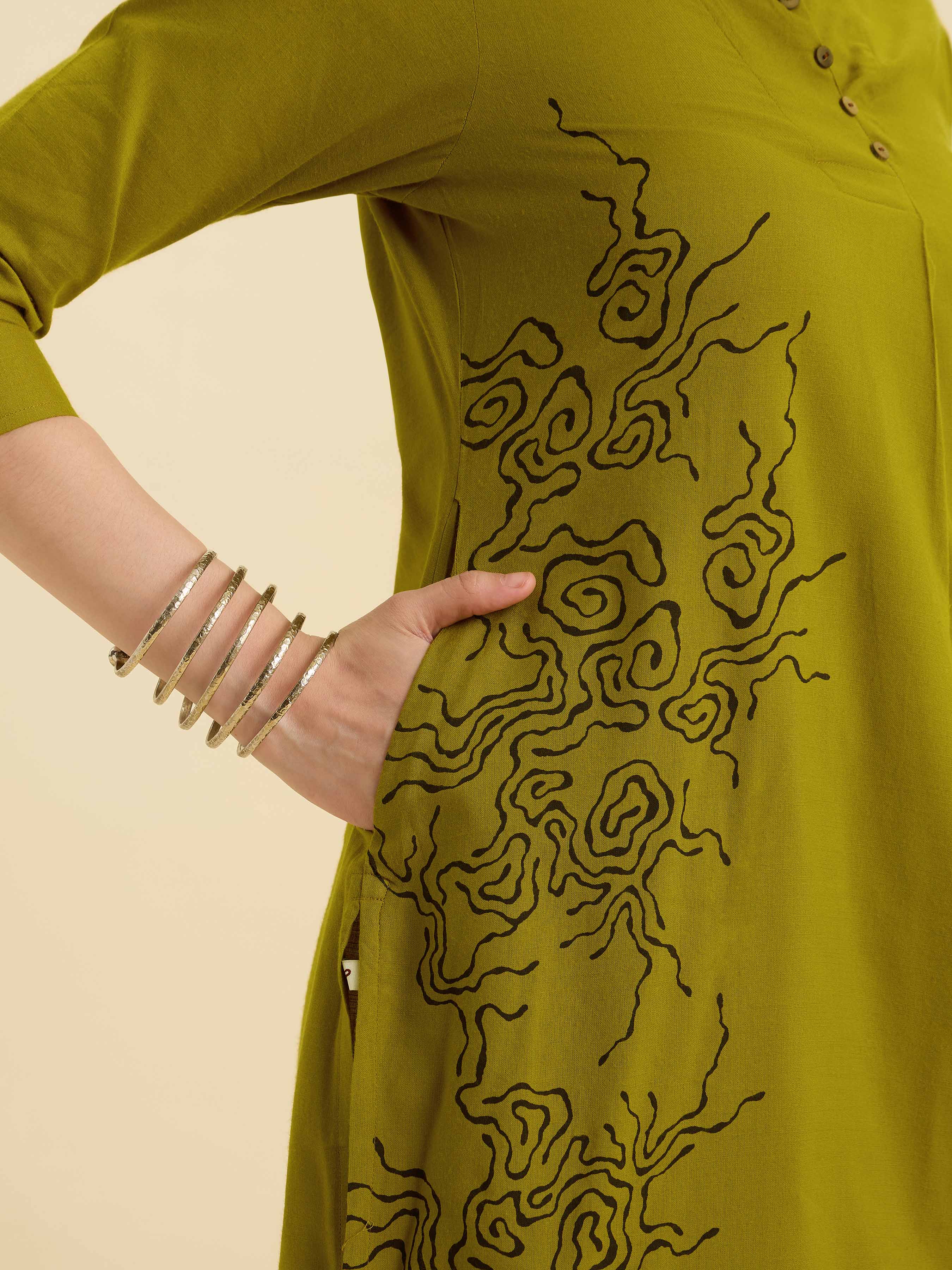 Olive Yellow Cotton Viscose Plain Slit Kurti With Placement Print, Knife Pleats & Curved Hemline