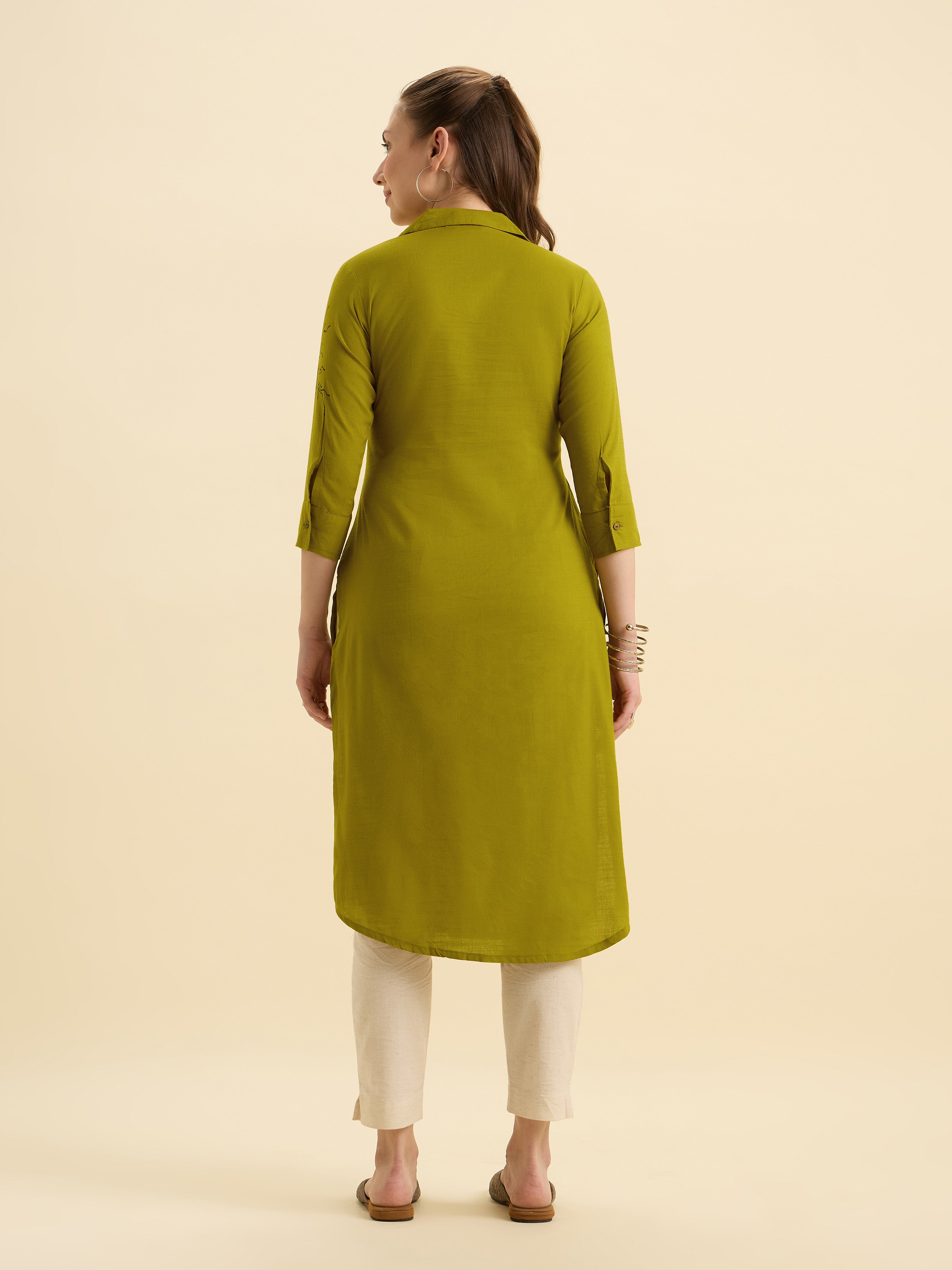 Olive Yellow Cotton Viscose Plain Slit Kurti With Placement Print, Knife Pleats & Curved Hemline