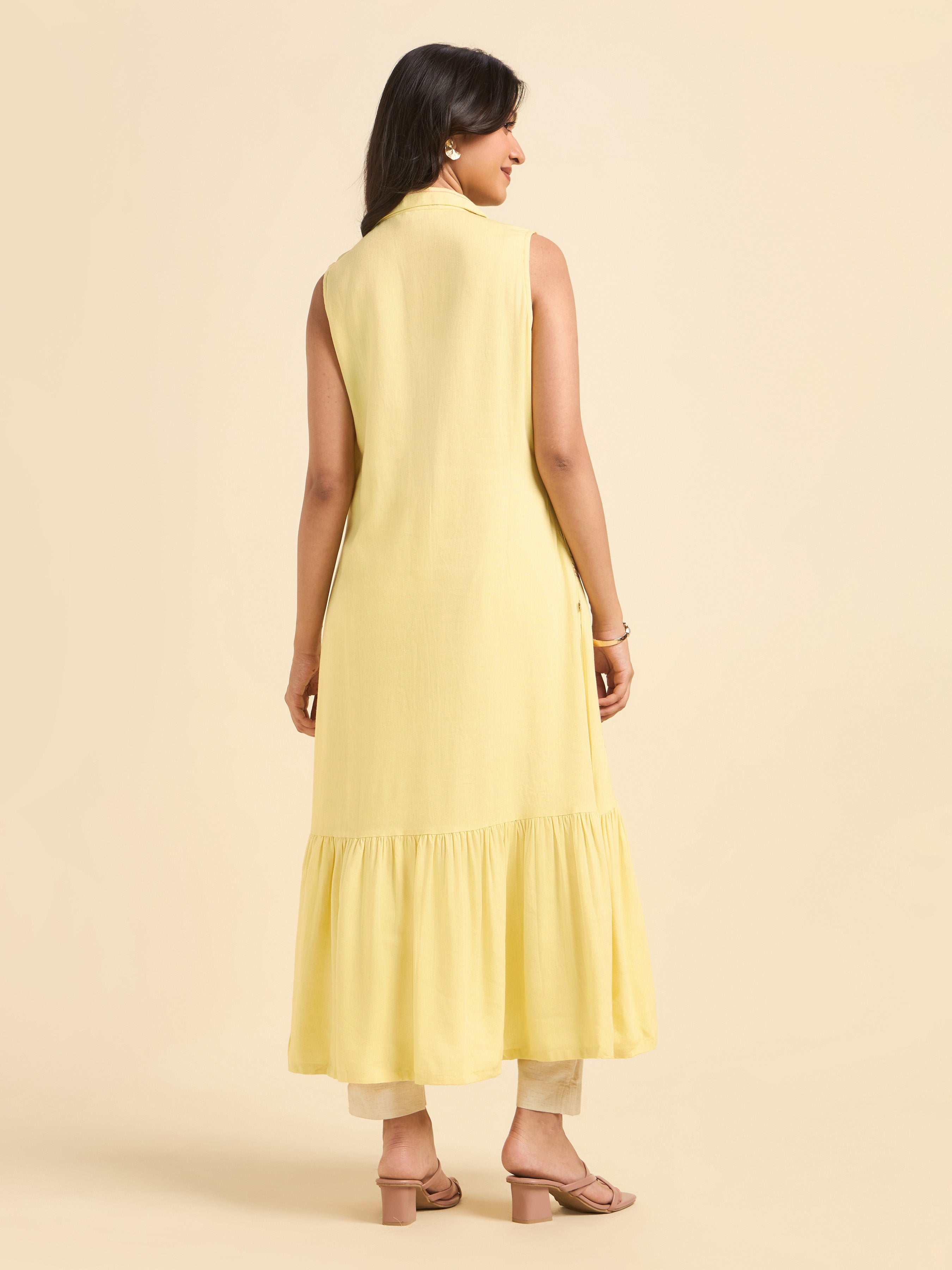 Pale Yellow Viscose Linen Plain Flared Sleeveless Kurti With Embroidery