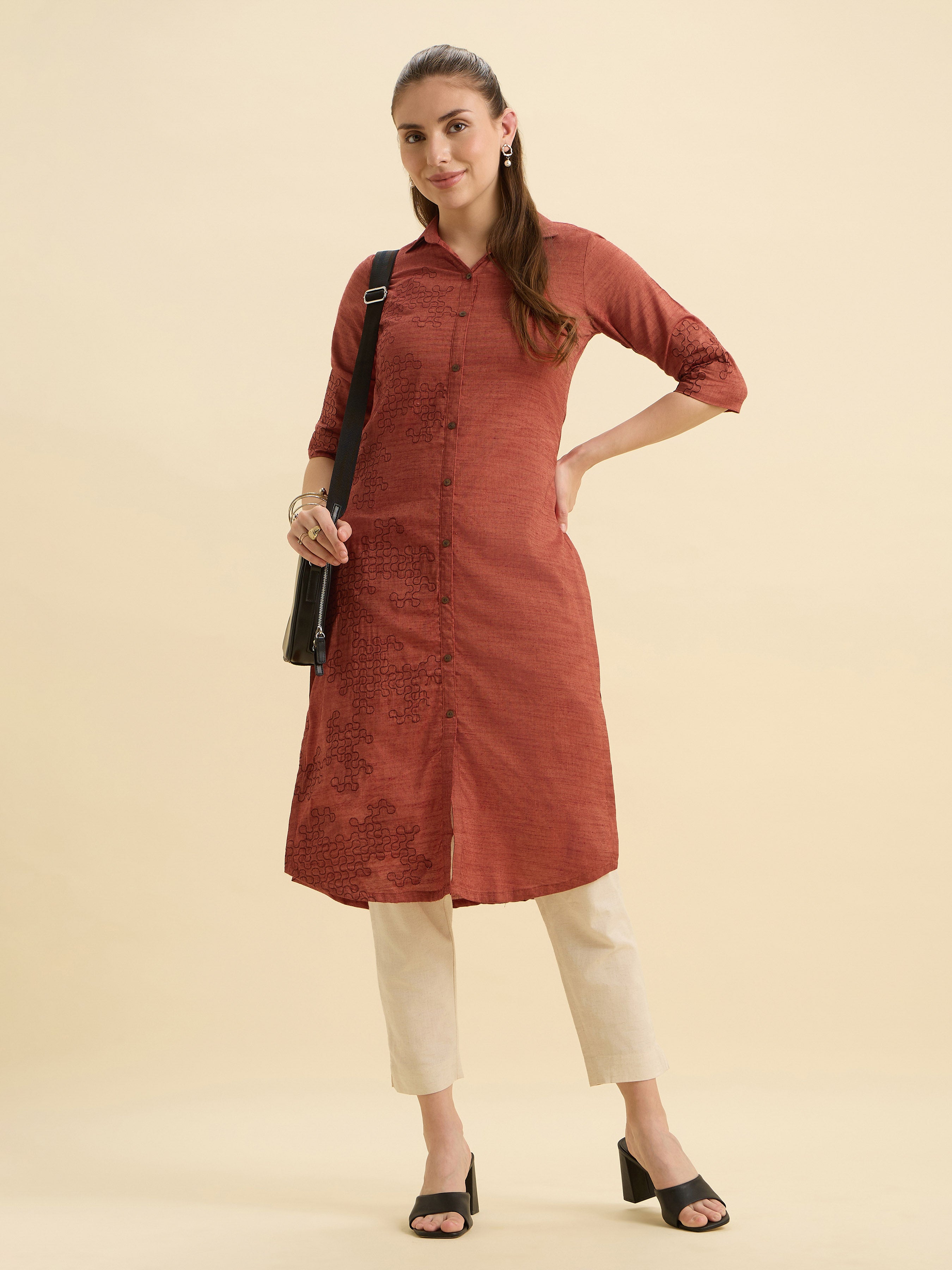 Rust Orange Cotton Viscose Slitted Kurti With Embroidery And Curved Hemline