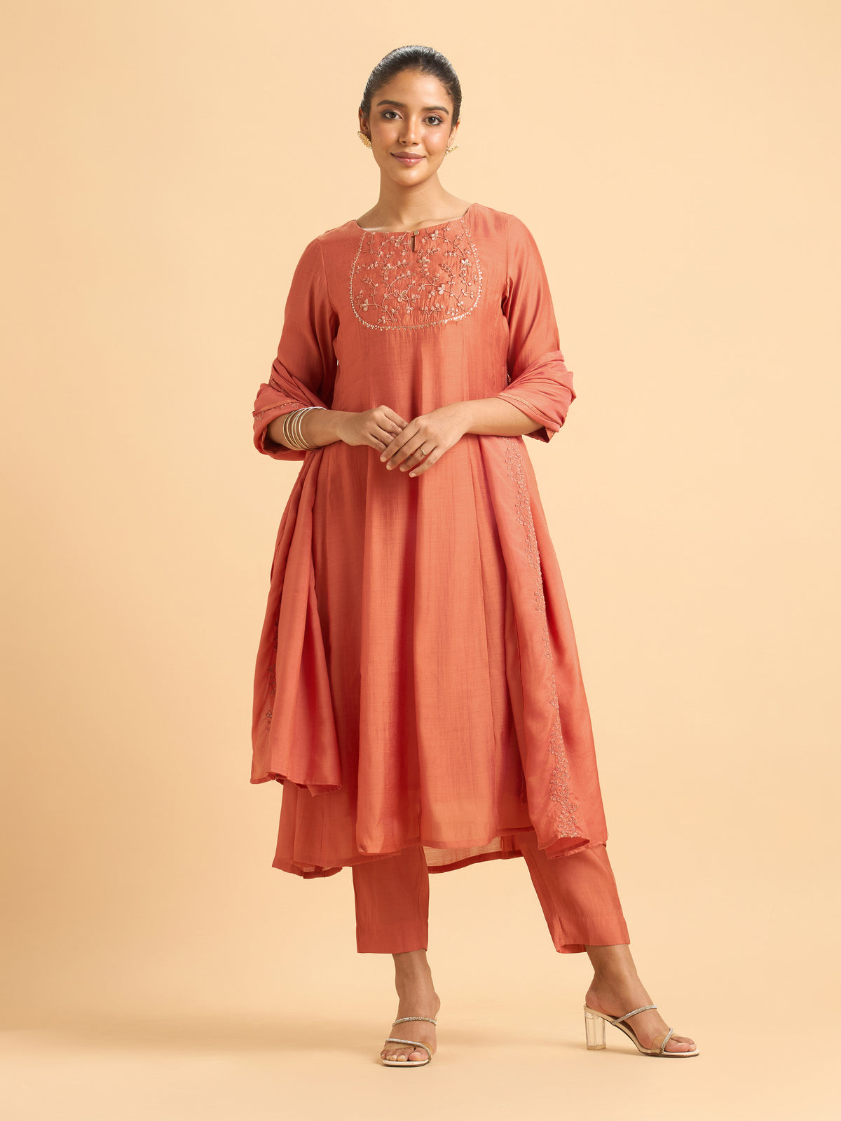 Rust Orange Modal Chanderi Plain Flared Kali Cut Kurti Set With Embroidery,Sequins Work,And Dupatta.