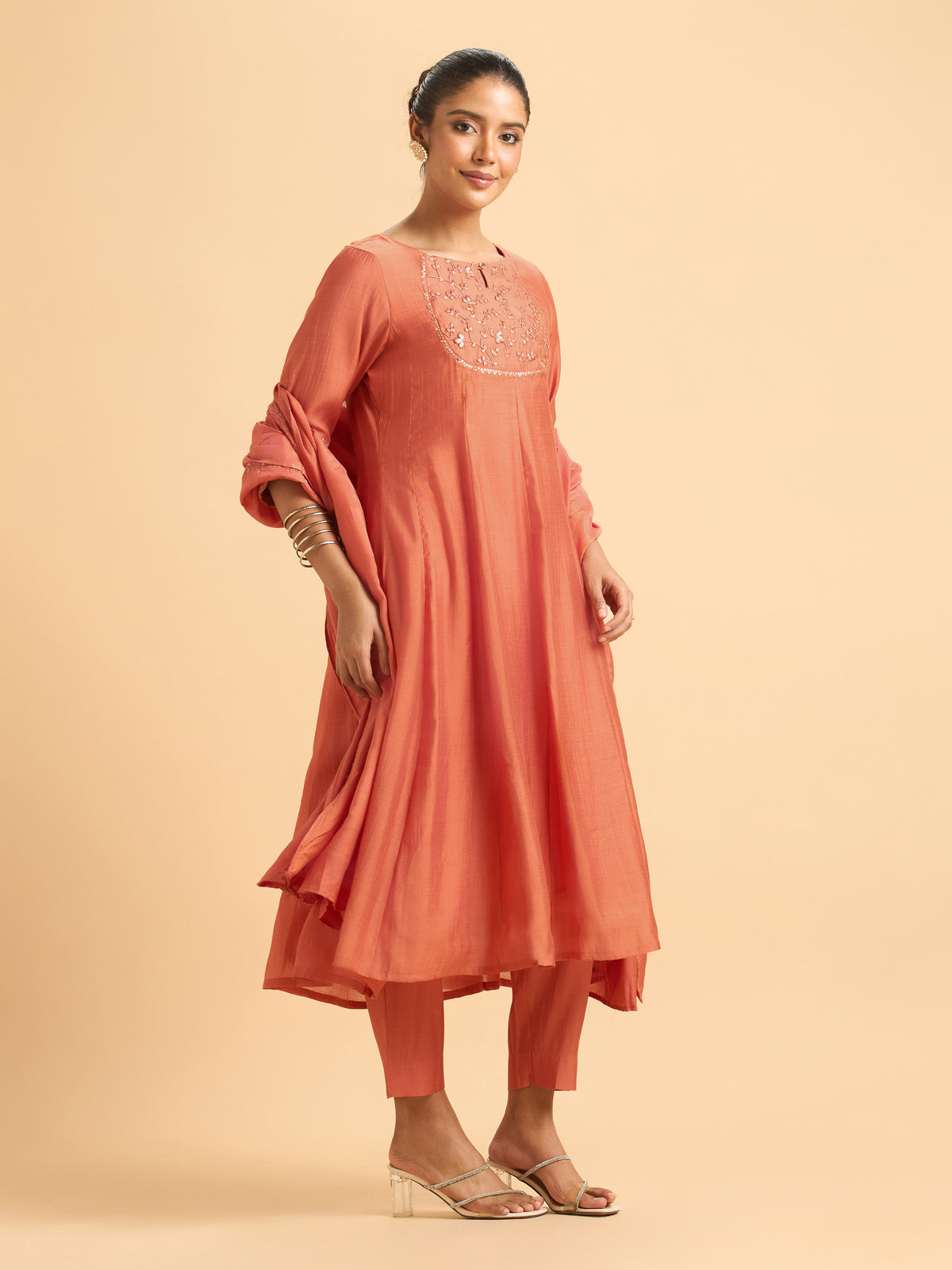 Rust Orange Modal Chanderi Plain Flared Kali Cut Kurti Set With Embroidery,Sequins Work,And Dupatta.
