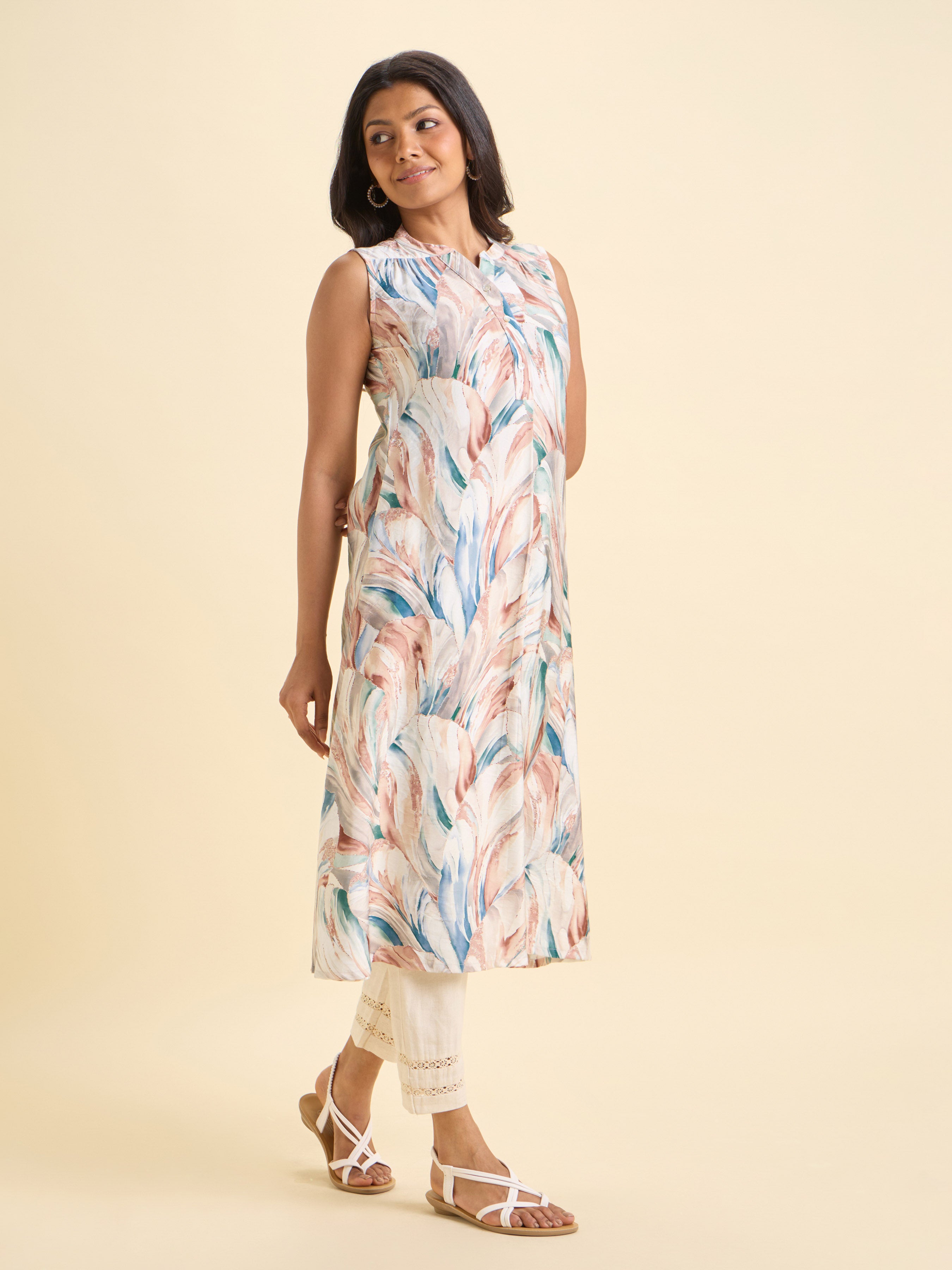 White Multi Colour Poly Viscose Print Flared Sleeve Less Kurti With Knife Pleat